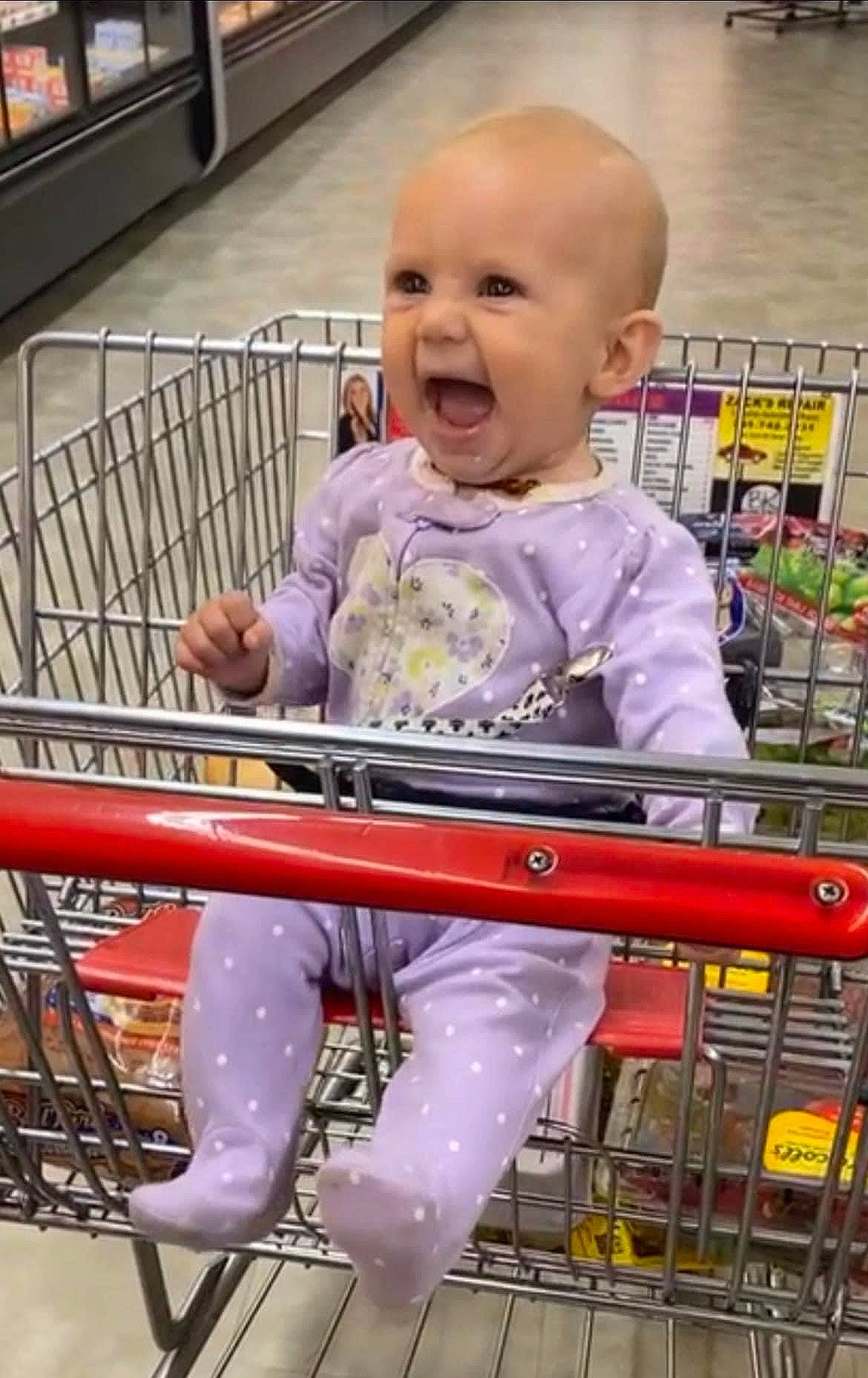Hailyn joined the competition — help win amazing prizes! baby, baby_safety, baby_toddler_clothing, cart, child, customer, engineering, fun, happy, person, retail, service, shelf, shopping, shopping_cart, sitting, sleeve, smile, t_shirt, toddler