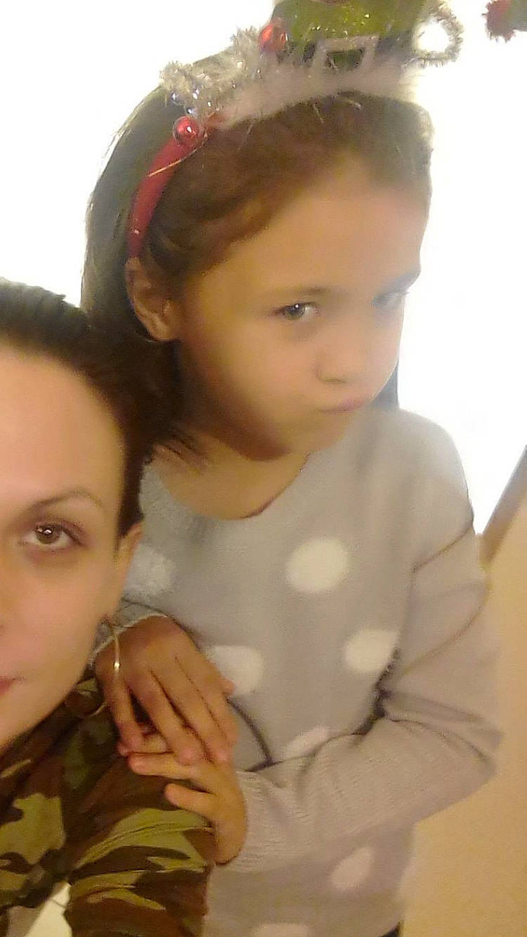 Heidi is registered to the contest to win money with this photo: cheek, child, face, forehead, gesture, hair_accessory, head, headband, nose, person, skin, smile, toddler