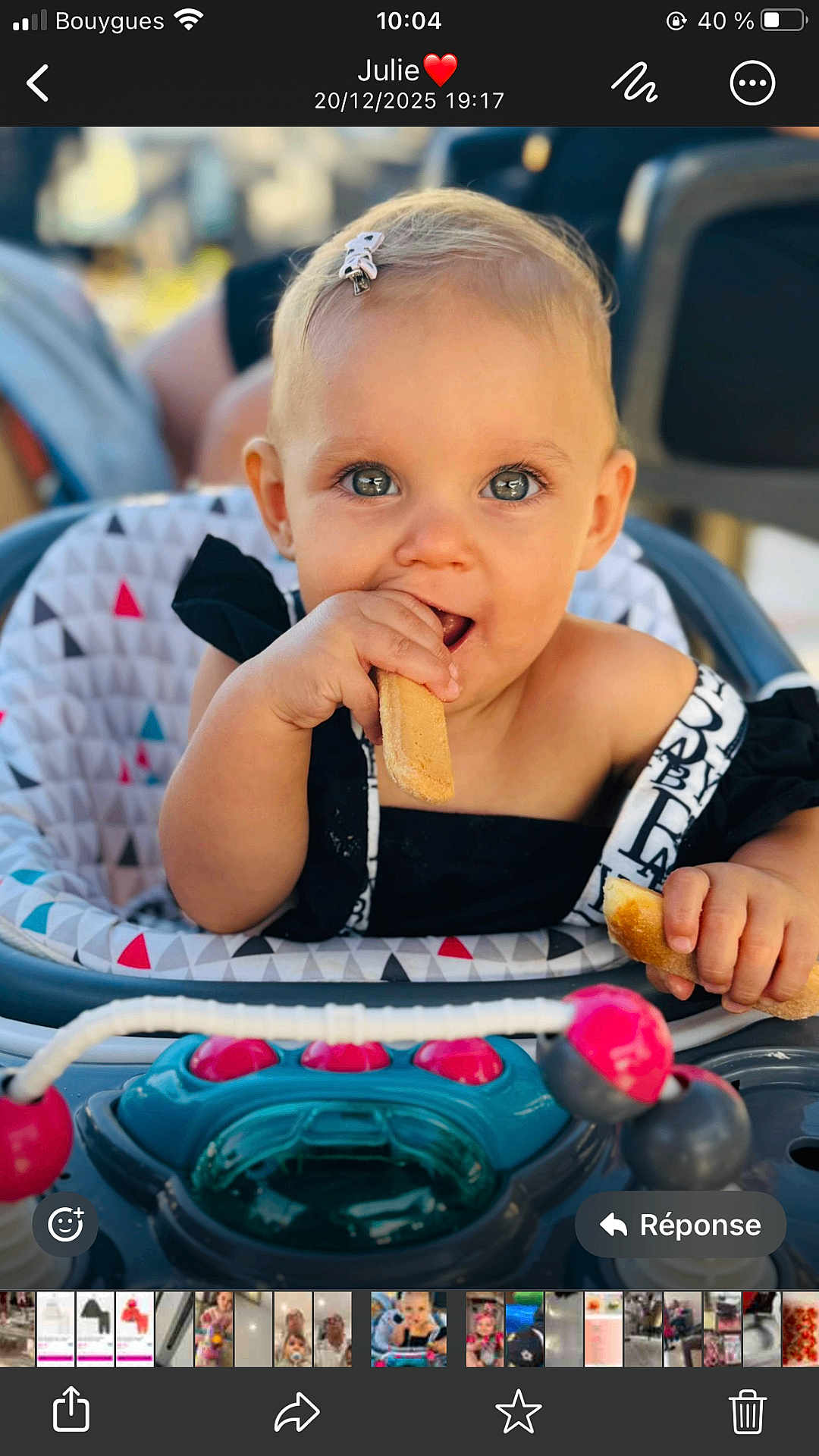 Rosalia participe au concours pour gagner de l'argent avec cette photo : toddler, baby, child, eating, biscuit, high_chair, toy, hair_clip, smiling, face, hand, indoor, closeup, cute, playful, seat, clothing, person, infant, happy