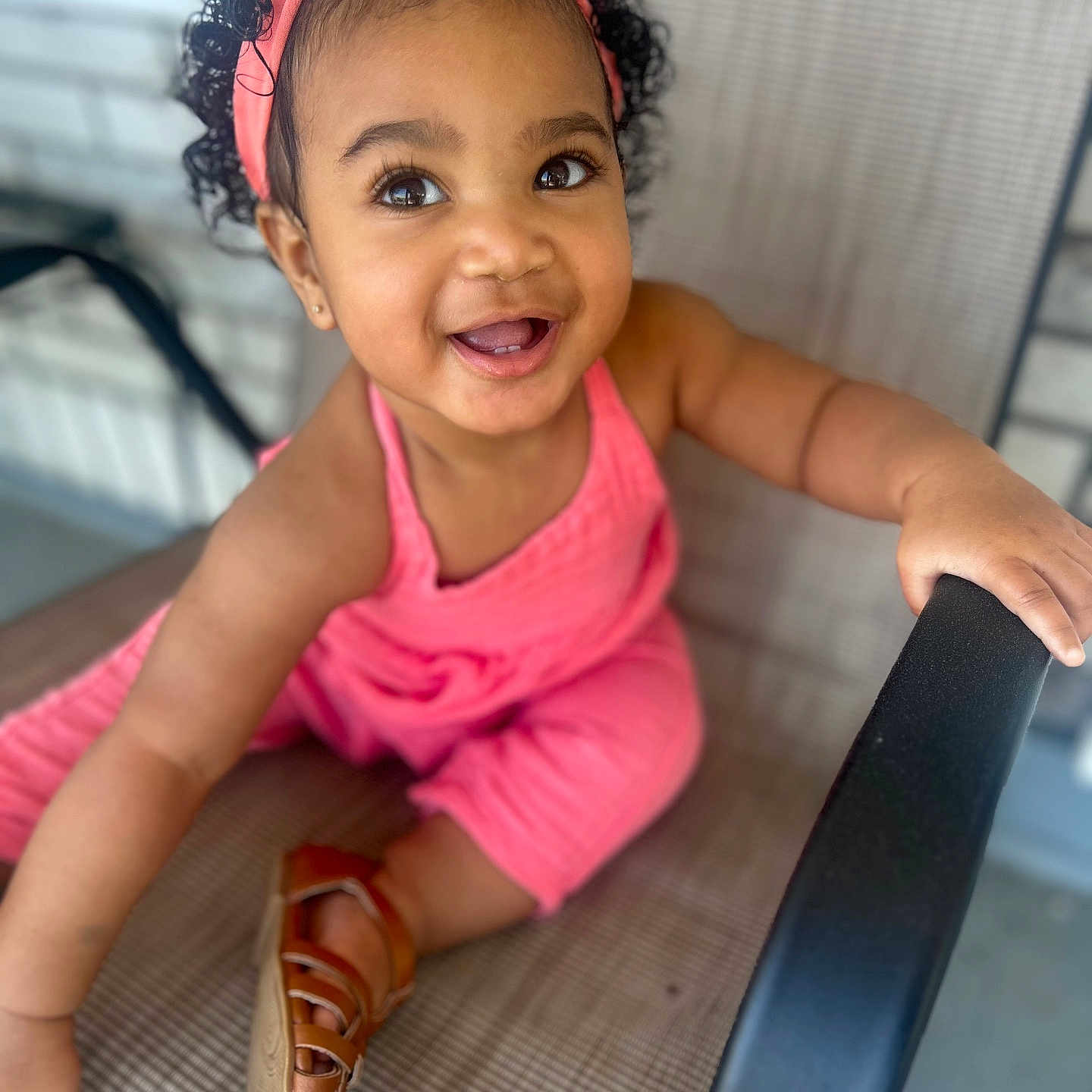 Novalee joined the competition — help win amazing prizes! baby, babylaughing, child, clothing, dress, face, female, footwear, girl, hair, happy, head, laughing, person, photography, portrait, sandal, sitting, sleeve, smile