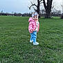 Karina joined the competition — help win amazing prizes! child, toddler, pink_jacket, headband, smile, standing, grass, field, park, trees, nature, sneakers, jeans, portrait, outdoors, cold_weather, playful, bokeh, cute, young_child