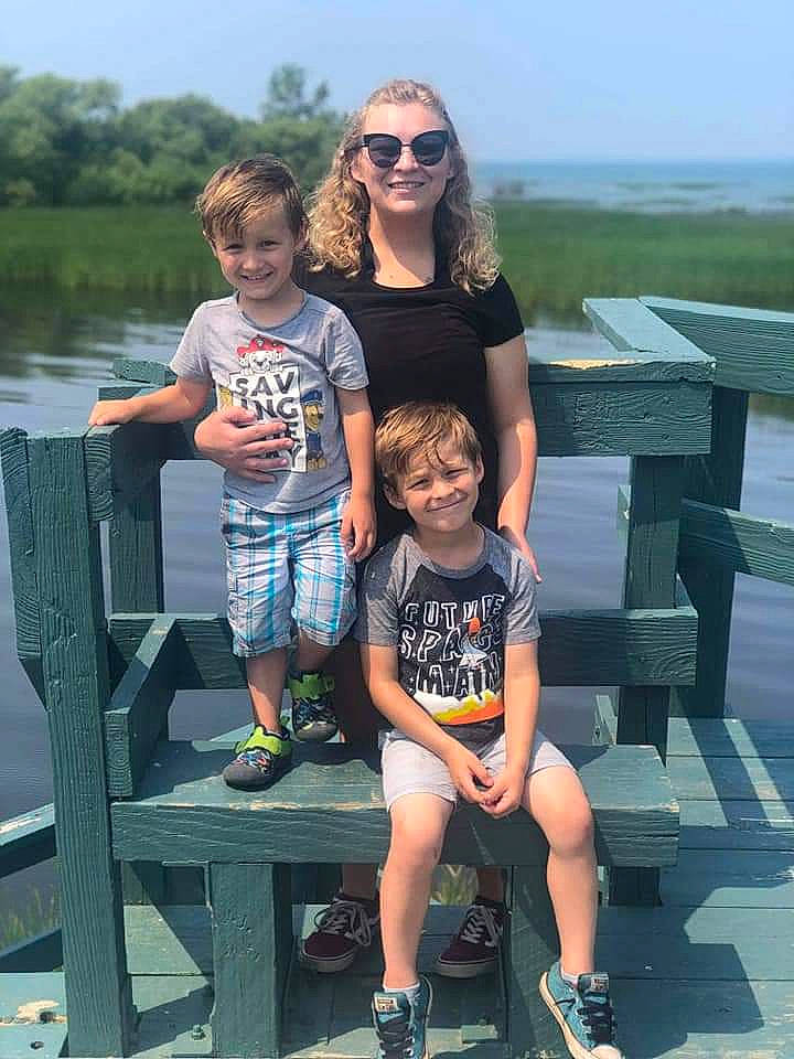 Kelvin is registered to the contest to win money with this photo: child, daughter, family, fun, glasses, headwear, joy, leisure, person, shorts, smile, style, summer, sunglasses, tourism, tree, vacation