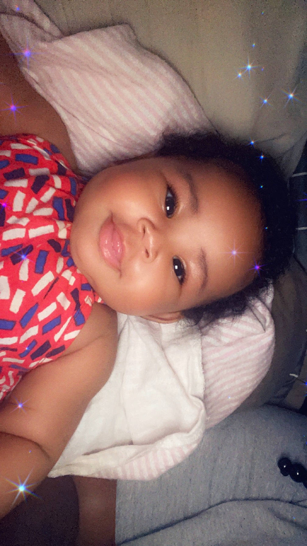 Lani is registered to the contest to win money with this photo: black_hair, cheek, child, cool, eye, eyebrow, eyelash, facial_expression, forehead, hairstyle, human, iris, lip, mouth, nose, person, pink, skin, smile, textile