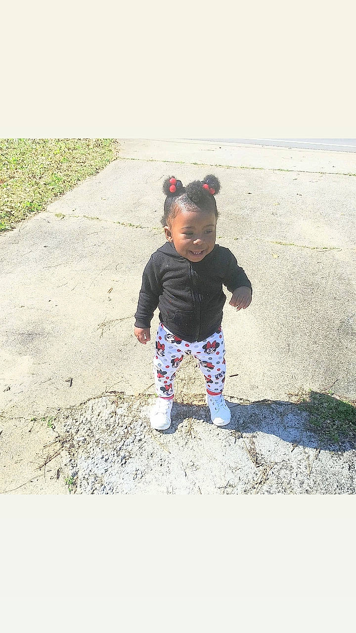 Makaiyah is registered to the contest to win money with this photo: asphalt, baby, baby_toddler_clothing, beach, body_of_water, fun, grass, happy, joy, landscape, pattern, people_in_nature, person, recreation, sand, shadow, sleeve, soil, t_shirt, tints_and_shades