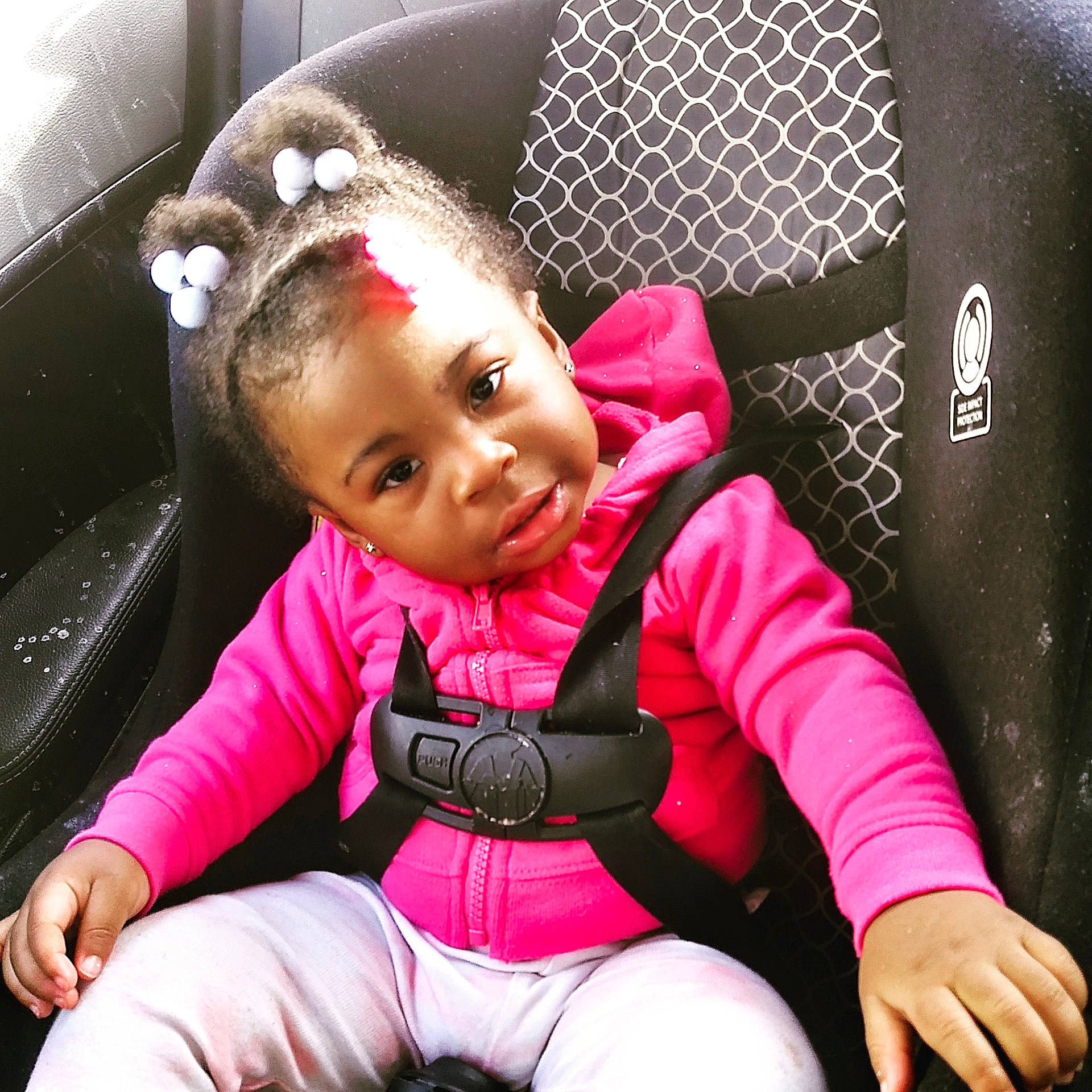 Makaiyah Young is registered to the contest to win money with this photo: auto_part, baby_toddler_clothing, car_seat, child, comfort, cool, facial_expression, flash_photography, fun, happy, lap, leisure, mammal, person, pink, product, skin, sleeve, toddler, vertebrate