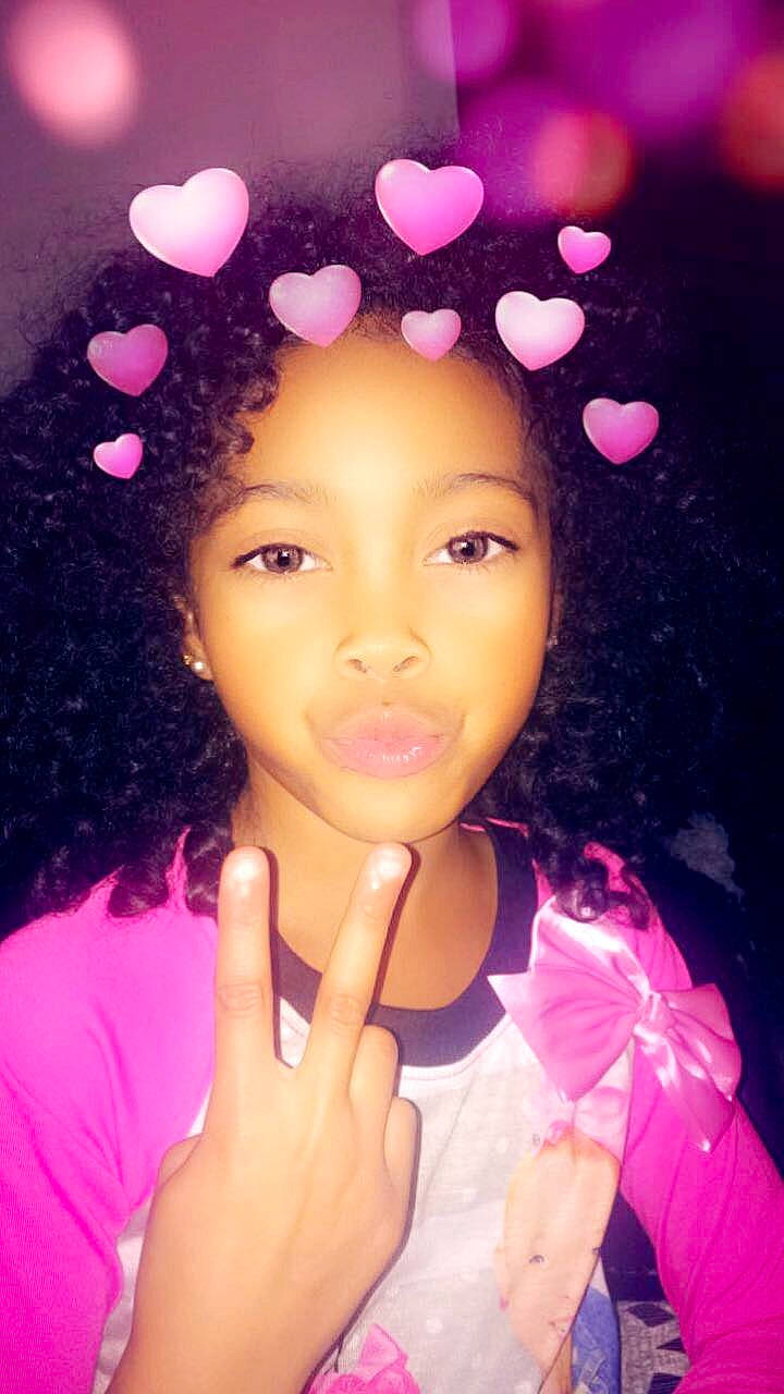 Semaj is registered to the contest to win money with this photo: beauty, black_hair, cheek, chin, eyebrow, face, forehead, fun, girl, hairstyle, head, human_hair_color, lip, magenta, mouth, nose, person, pink, purple, skin