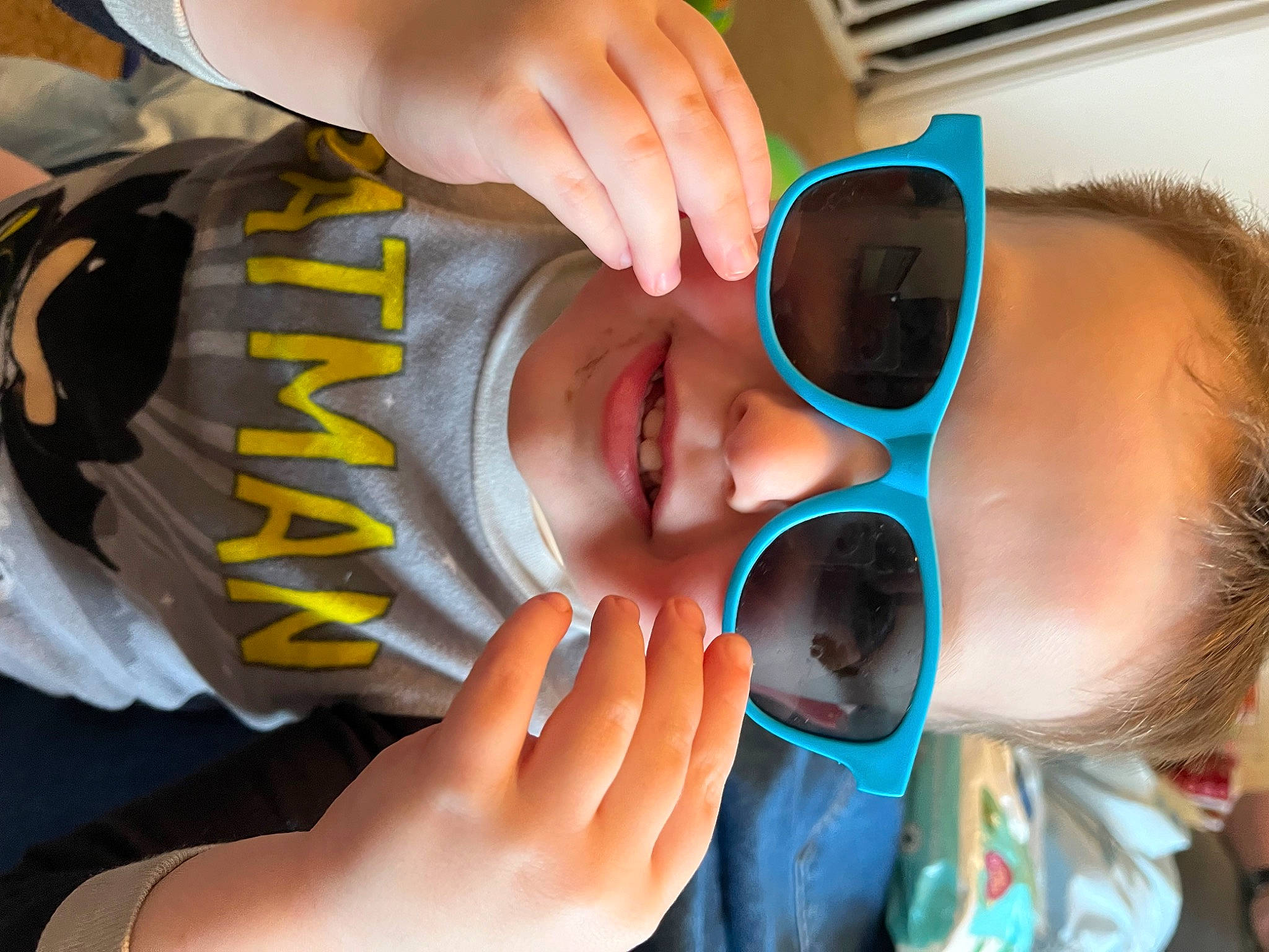Luke is registered to the contest to win money with this photo: ear, eye, eyelash, eyewear, facial_expression, finger, gesture, glasses, goggles, hairstyle, hand, happy, mouth, nail, nose, person, skin, smile, sunglasses, vision_care