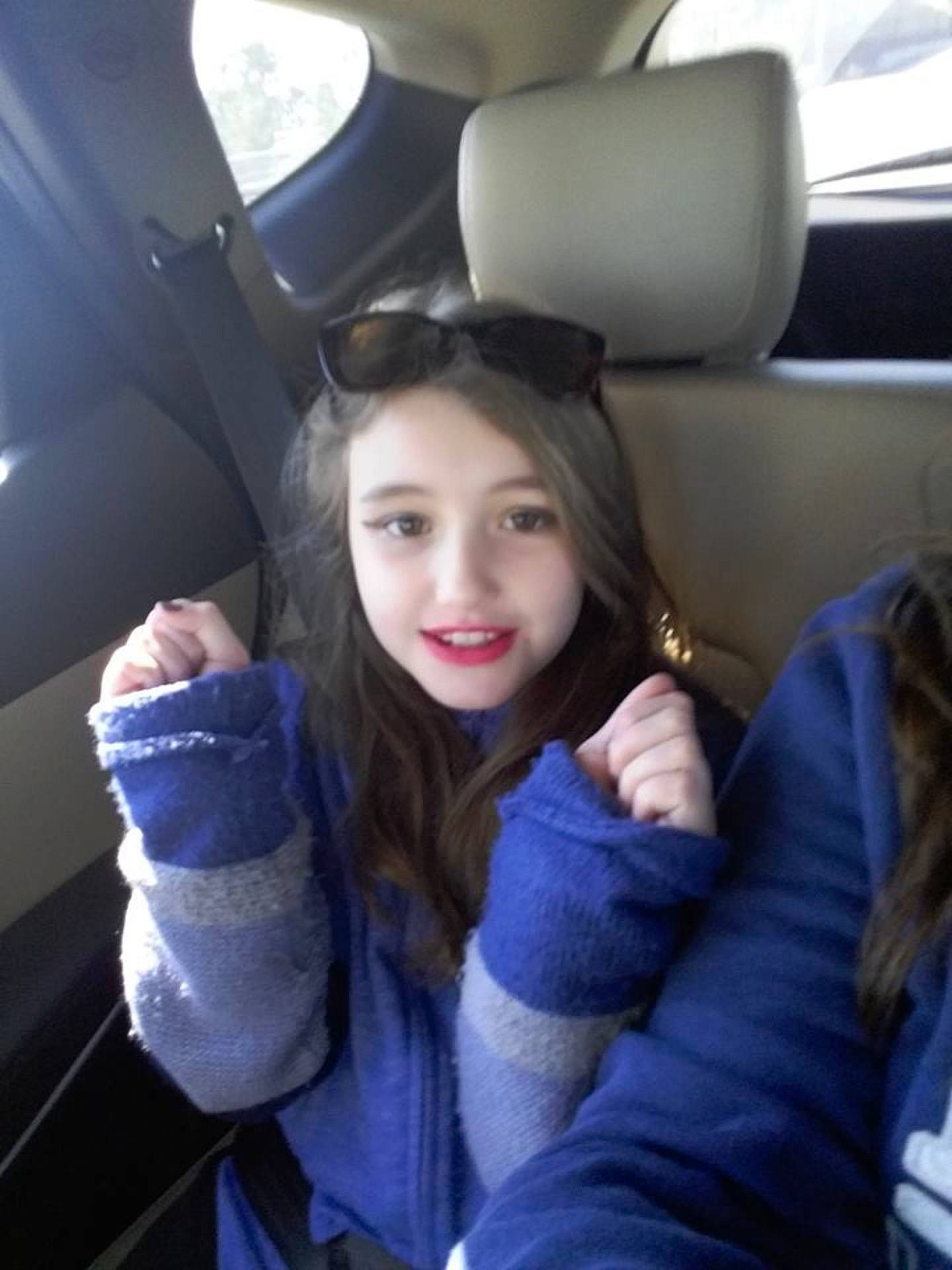 Nicolette is registered to the contest to win money with this photo: beauty, black_hair, brown_hair, car, cool, family_car, fun, fur, girl, joy, long_hair, person, photography, product, selfie, smile, snapshot, textile