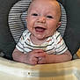 baby, smiling, high_chair, striped_shirt, food, messy, happy, child, infant, face, hands, indoor, meal, cute, young, person, expression, seat, table, tongue