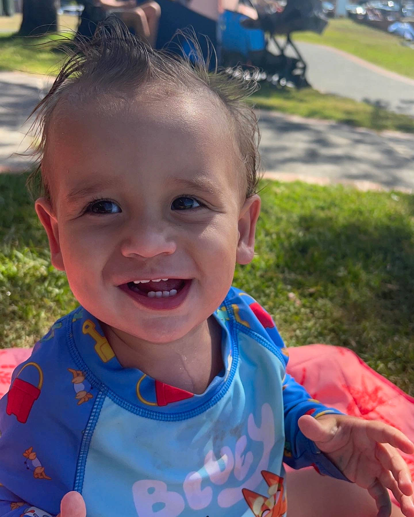 Archie is registered to the contest to win money with this photo: baby_toddler_clothing, child, cool, face, fun, grass, happy, iris, joy, leaf, leisure, lip, mouth, person, photograph, plant, recreation, skin, smile, summer