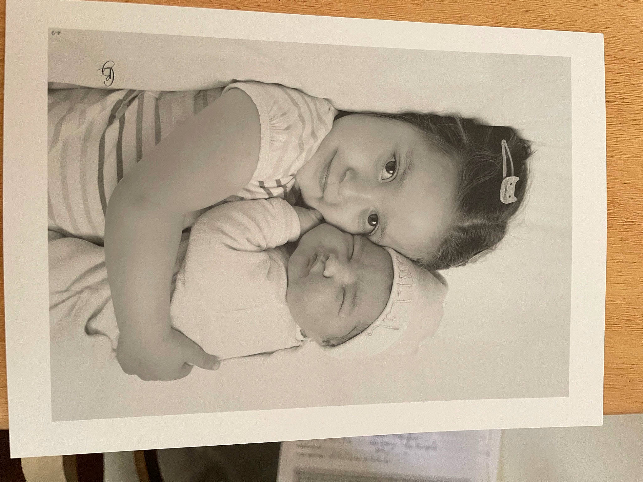 Sirine participe au concours pour gagner de l'argent avec cette photo : art, baby, baby_toddler_clothing, child, font, happy, illustration, monochrome, monochrome_photography, paper_product, person, photo_caption, photographic_paper, picture_frame, portrait_photography, rectangle, room, stock_photography, toddler, vintage_clothing