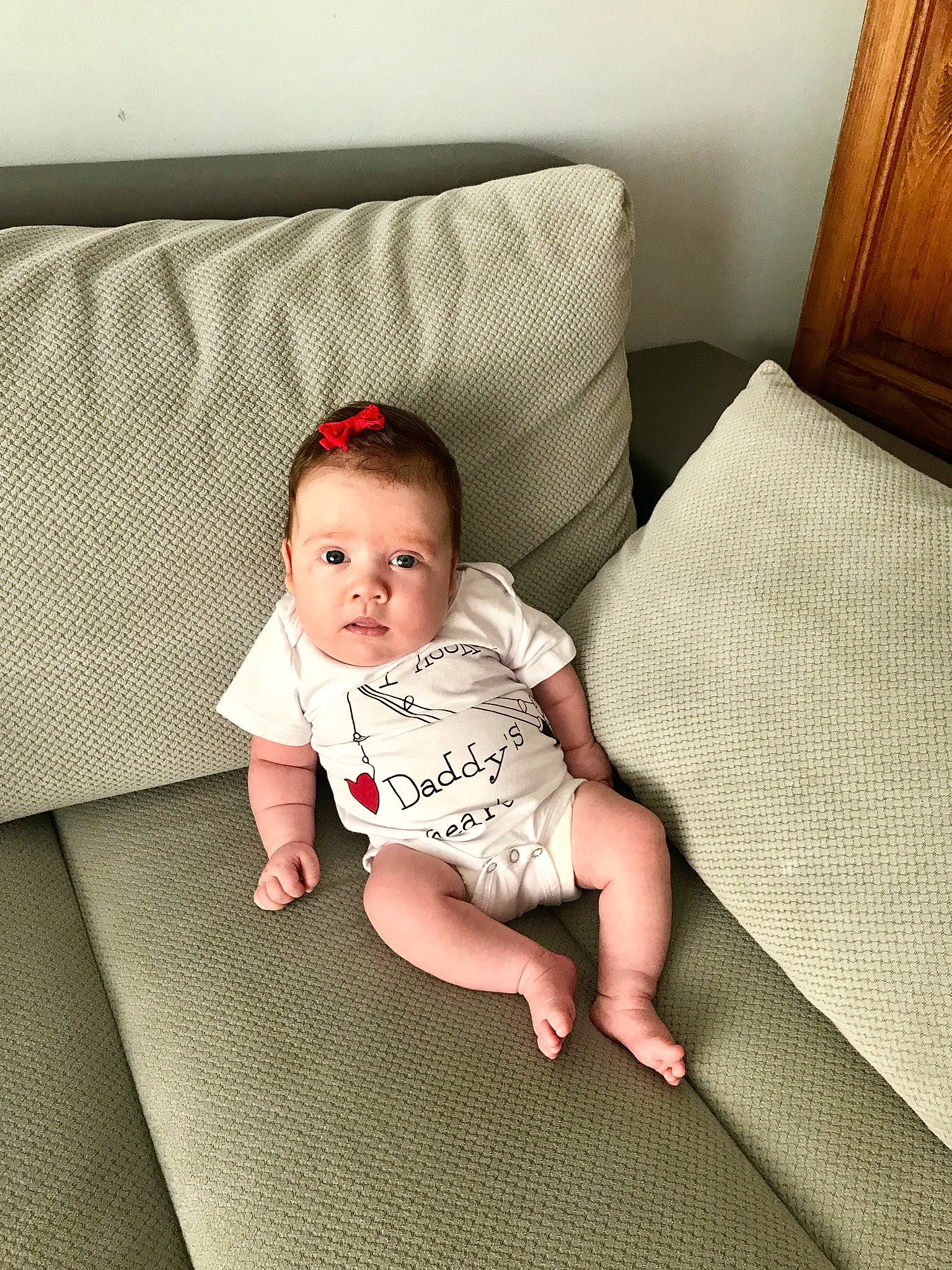 Bianka is registered to the contest to win money with this photo: baby, bed, bedding, child, comfort, couch, furniture, leg, linens, person, product, room, sitting, textile, toddler