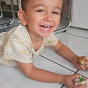 Shemsy participe au concours pour gagner de l'argent avec cette photo : arm, bread, casual, child, clothing, cute, floor, happy, head, indoor, kitchen, laughter, person, play, short_sleeve, smiling, tile, toddler, toy, young_child
