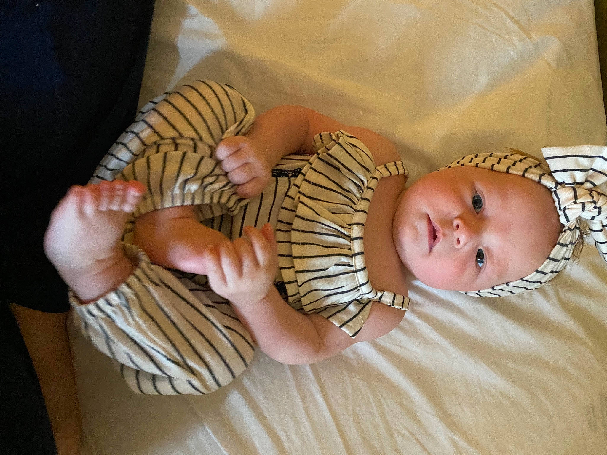 Adalynne joined the competition — help win amazing prizes! baby, baby_products, baby_toddler_clothing, bedtime, child, comfort, finger, foot, iris, linens, nail, nap, person, room, sitting, skin, sock, thumb, toddler, vertebrate