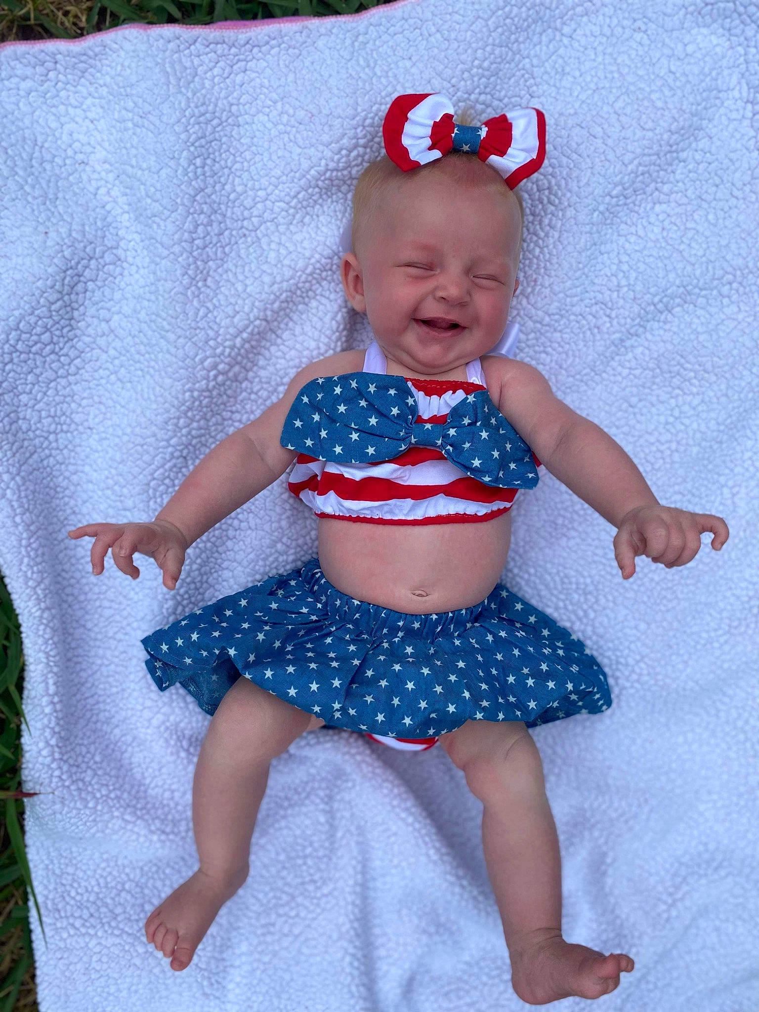 Adalynne joined the competition — help win amazing prizes! abdomen, baby, baby_toddler_clothing, child, electric_blue, fun, goggles, happy, human_leg, pattern, person, purple, sitting, sleeve, smile, sunglasses, textile, thigh, toddler, trunk