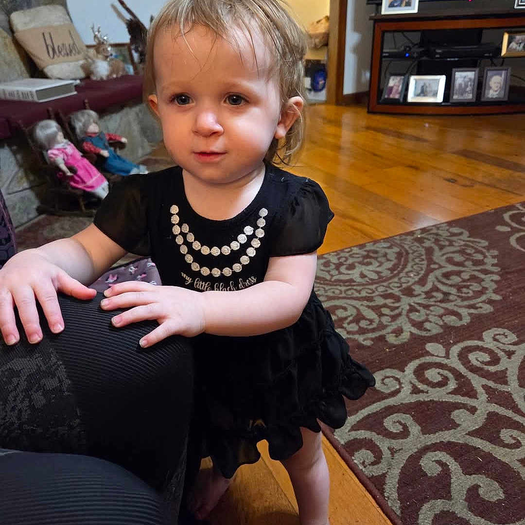 Hannah Spencer joined the competition — help win amazing prizes! accessories, architecture, child, clothing, couch, dress, face, female, furniture, girl, hardwood, head, jewelry, necklace, person, photoframe, photography, portrait, sitting, wood