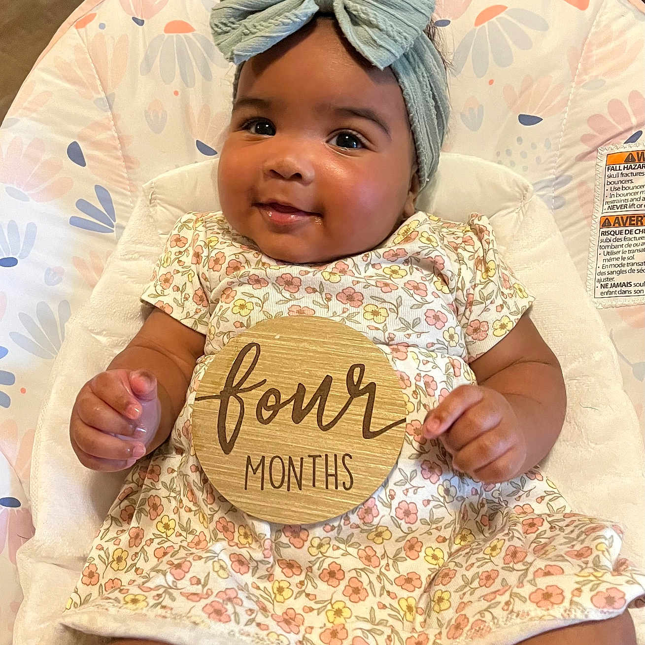 Lacy Jo is registered to the contest to win money with this photo: baby, babylaughing, beachwear, blanket, clothing, cushion, face, hair, happy, head, homedecor, person, photography, portrait, quilt, sitting, sleeve, smile, t_shirt, turban