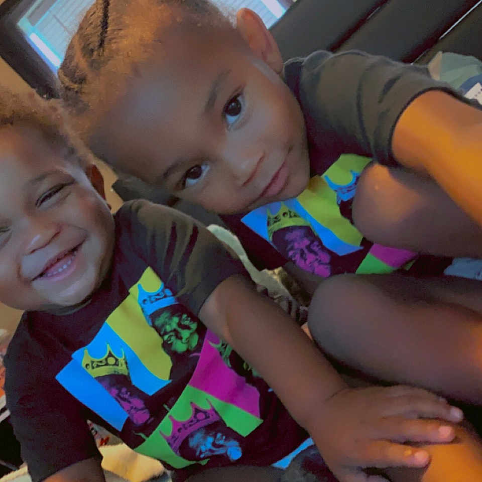 Levi is registered to the contest to win money with this photo: baby, bodypart, clothing, couch, face, finger, furniture, hand, happy, head, lifejacket, machine, person, photography, portrait, shorts, smile, transportation, vehicle, vest