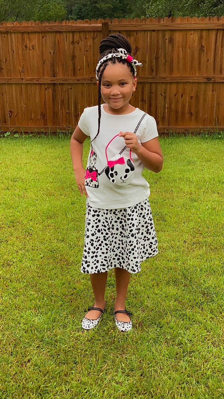 Kylee Rae joined the competition — help win amazing prizes! baby_toddler_clothing, baseball_cap, cap, child, clothing, eyewear, fashion_accessory, fence, fun, grass, grassland, happy, joy, pattern, people_in_nature, person, recreation, sleeve, smile, t_shirt