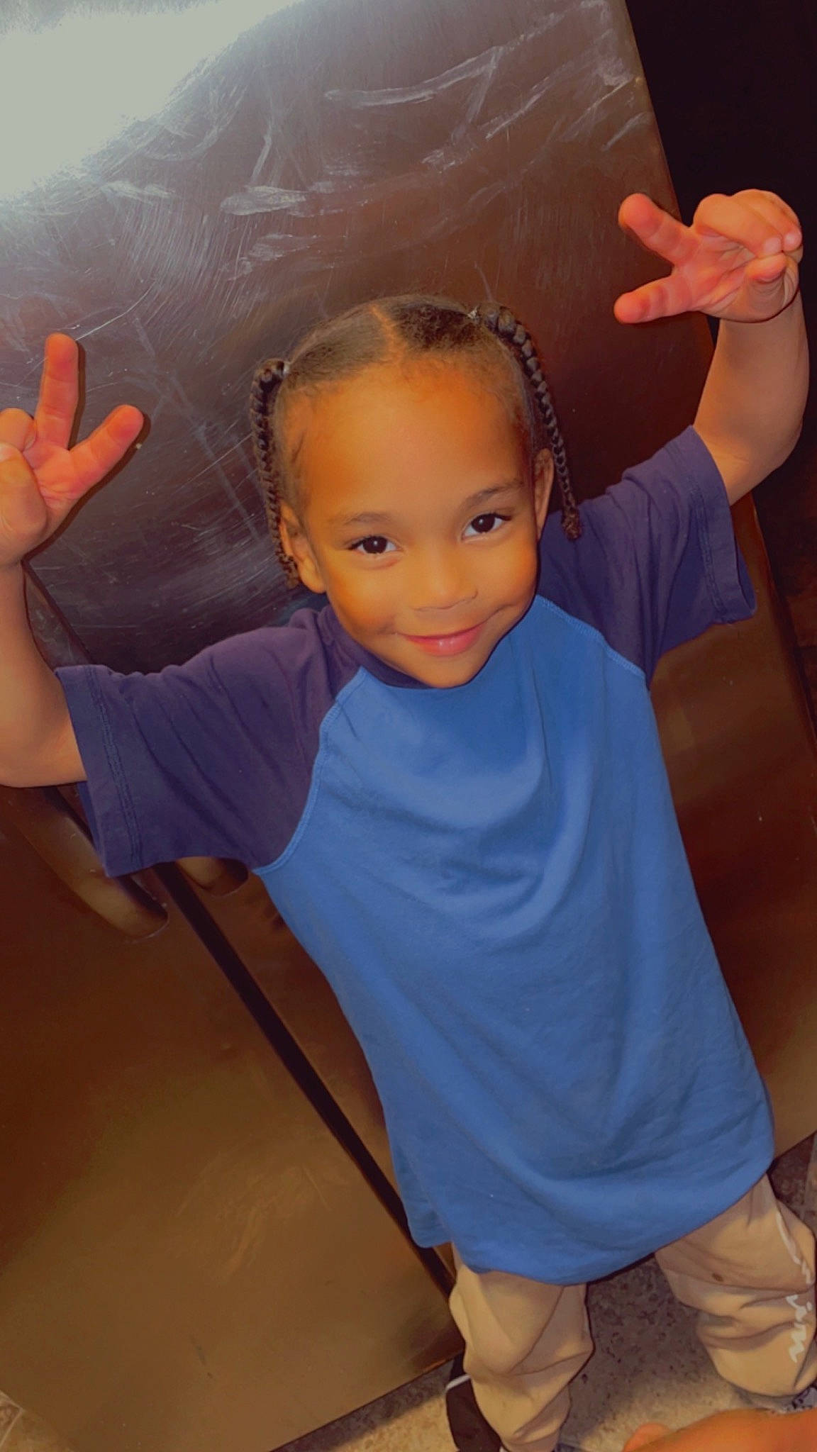 Tristan is registered to the contest to win money with this photo: arm, chin, cool, elbow, finger, gesture, hair, hand, happy, head, human_body, joint, joy, mouth, neck, nose, person, shoulder, skin, sleeve