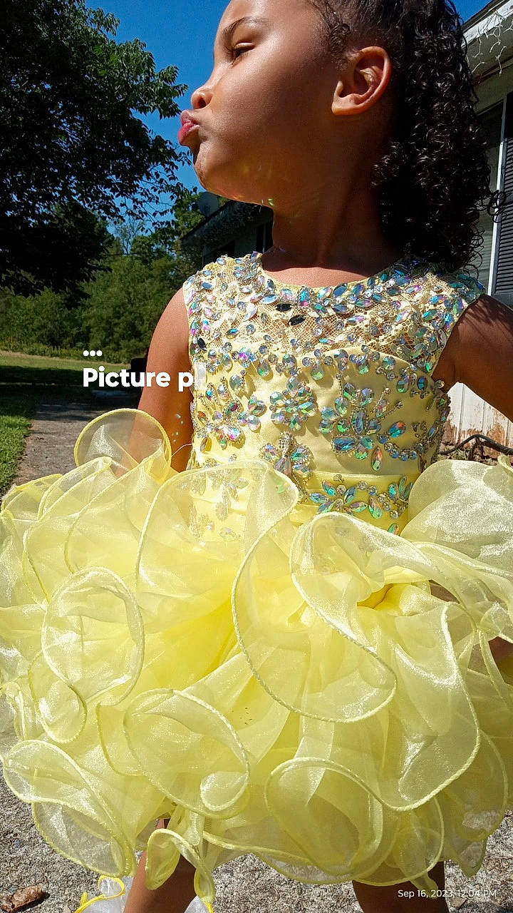 Jayla joined the competition — help win amazing prizes! beauty, bridal_accessory, bridal_party_dress, day_dress, dress, electric_blue, embellishment, event, fashion_accessory, fashion_design, formal_wear, gown, happy, haute_couture, jewellery, one_piece_garment, person, ruffle, sleeve, waist