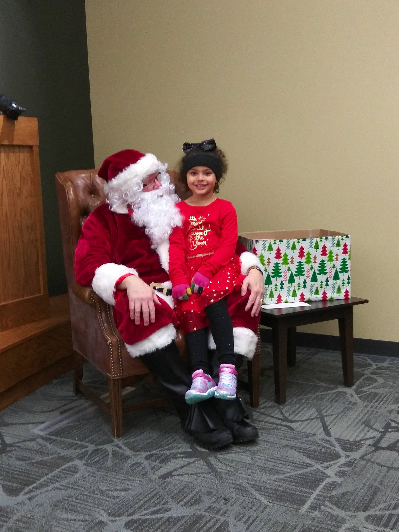 Breelyn joined the competition — help win amazing prizes! child, christmas, christmas_eve, christmas_stocking, christmas_tree, costume, event, fictional_character, fur, furniture, headwear, holiday, joy, lap, person, room, santa_claus, toddler