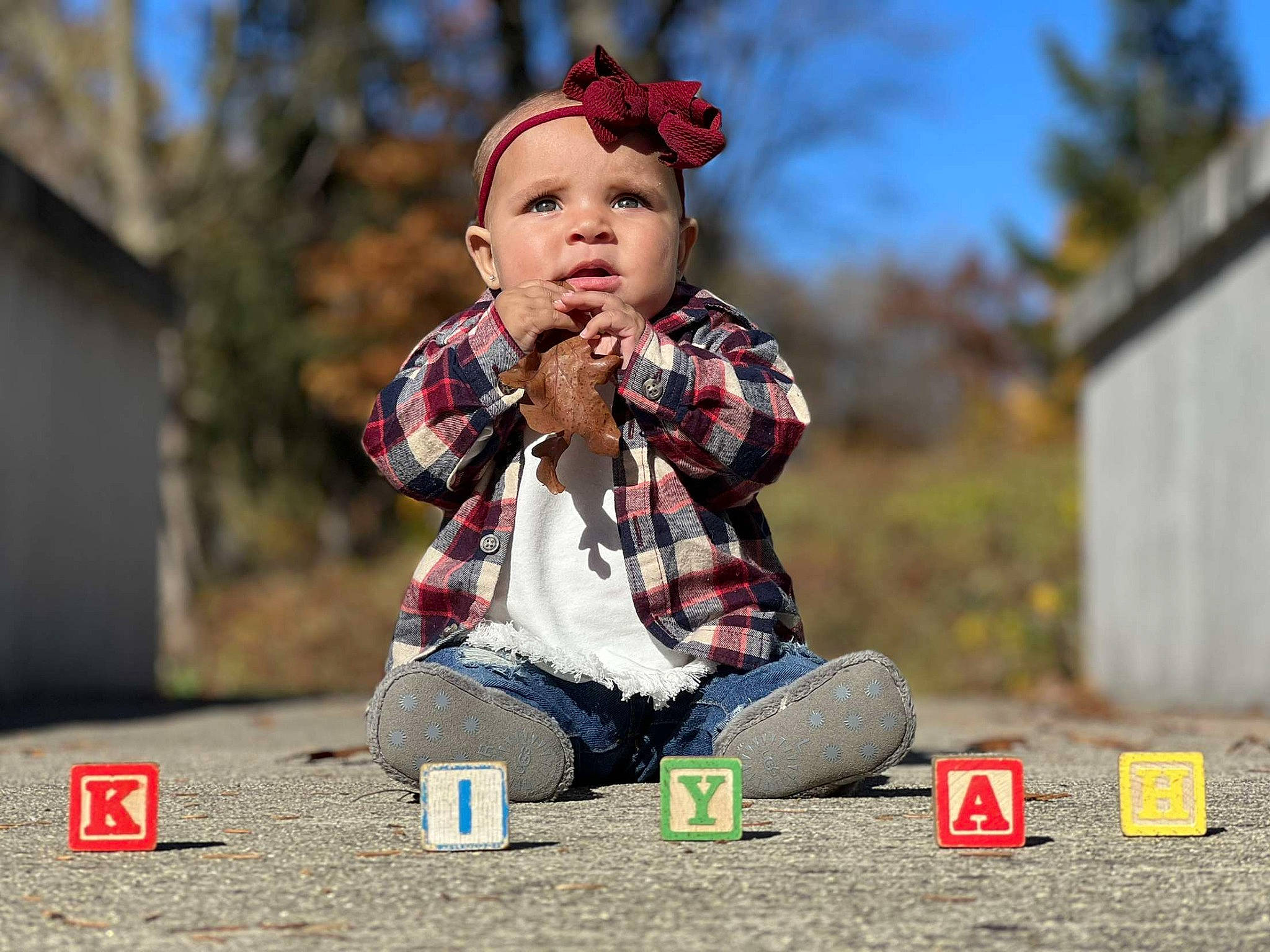 Kiyah joined the competition — help win amazing prizes! baby, child, flash_photography, fun, grass, happy, headwear, leisure, pattern, people_in_nature, person, plaid, plant, play, portrait_photography, recreation, sitting, sky, tartan, toddler