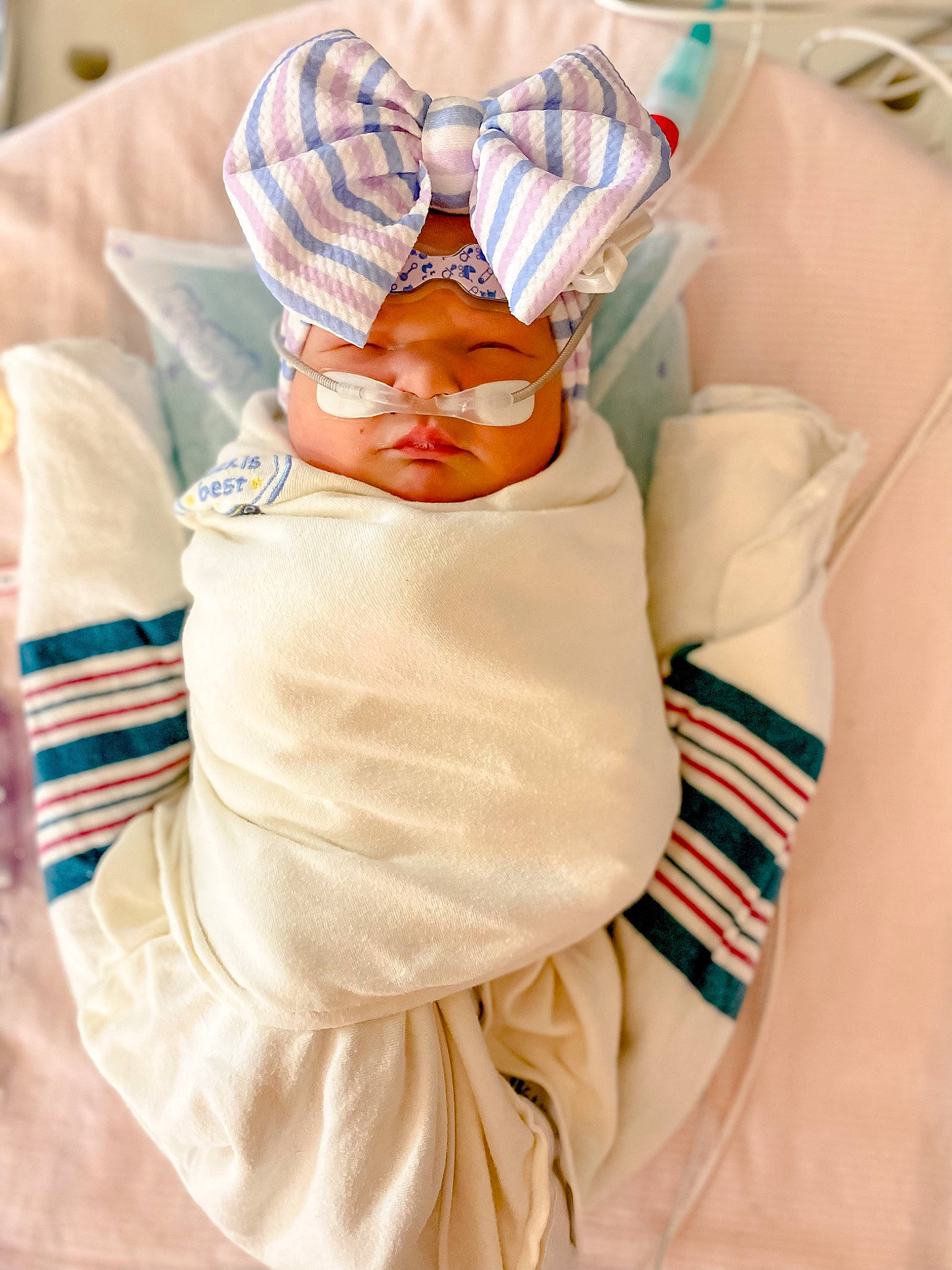 Khloe joined the competition — help win amazing prizes! abdomen, baby, baby_products, baby_sleeping, baby_toddler_clothing, child, comfort, costume, event, fashion_accessory, fictional_character, health_care, linens, medical, medical_procedure, nail, orange, peach, textile, toddler