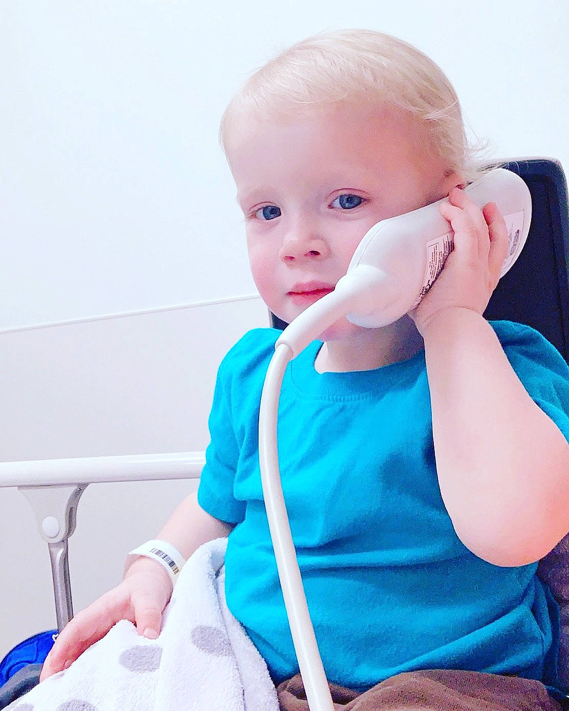 Daxtin is registered to the contest to win money with this photo: arm, baby, baby_products, blue, child, person, product, sitting, skin, toddler