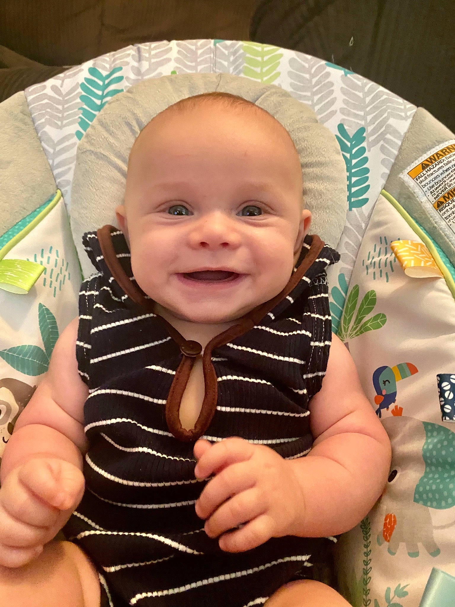 Declan is registered to the contest to win money with this photo: baby, baby_toddler_clothing, cheek, comfort, eye, finger, gesture, hairstyle, hand, happy, head, iris, joy, mouth, nail, nose, person, skin, sleeve, smile