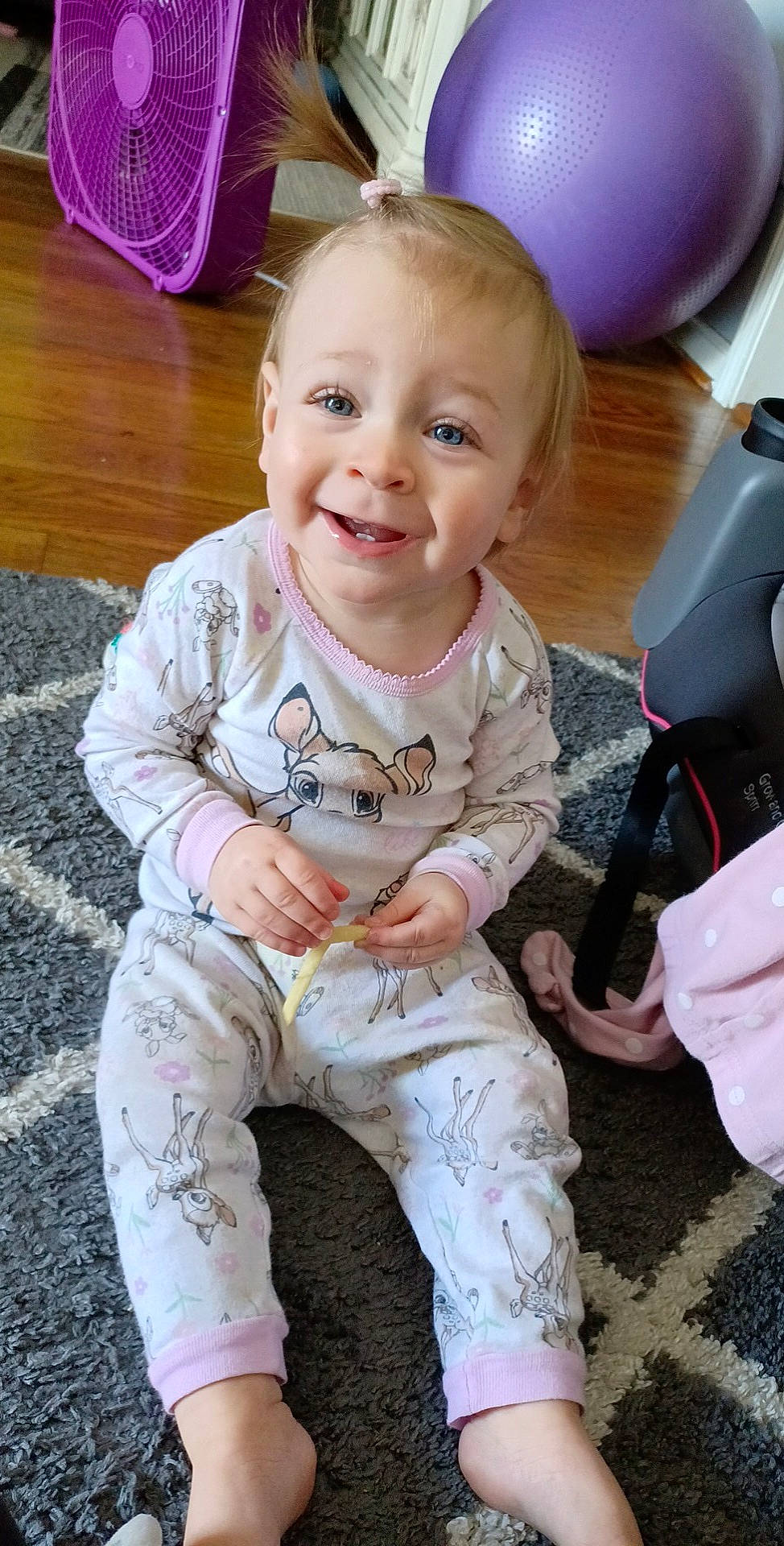 Allie Grace is registered to the contest to win money with this photo: baby, baby_toddler_clothing, cheek, child, chin, eye, face, floor, flooring, hair, hairstyle, happy, joy, mouth, person, pink, skin, sleeve, smile, standing
