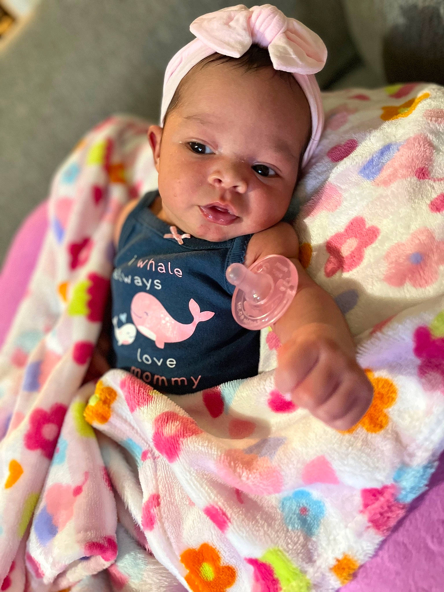 Avaya joined the competition — help win amazing prizes! baby, baby_products, baby_toddler_clothing, cheek, child, comfort, dress, eye, face, happy, head, linens, lip, pattern, person, pink, sitting, skin, sleeve, smile