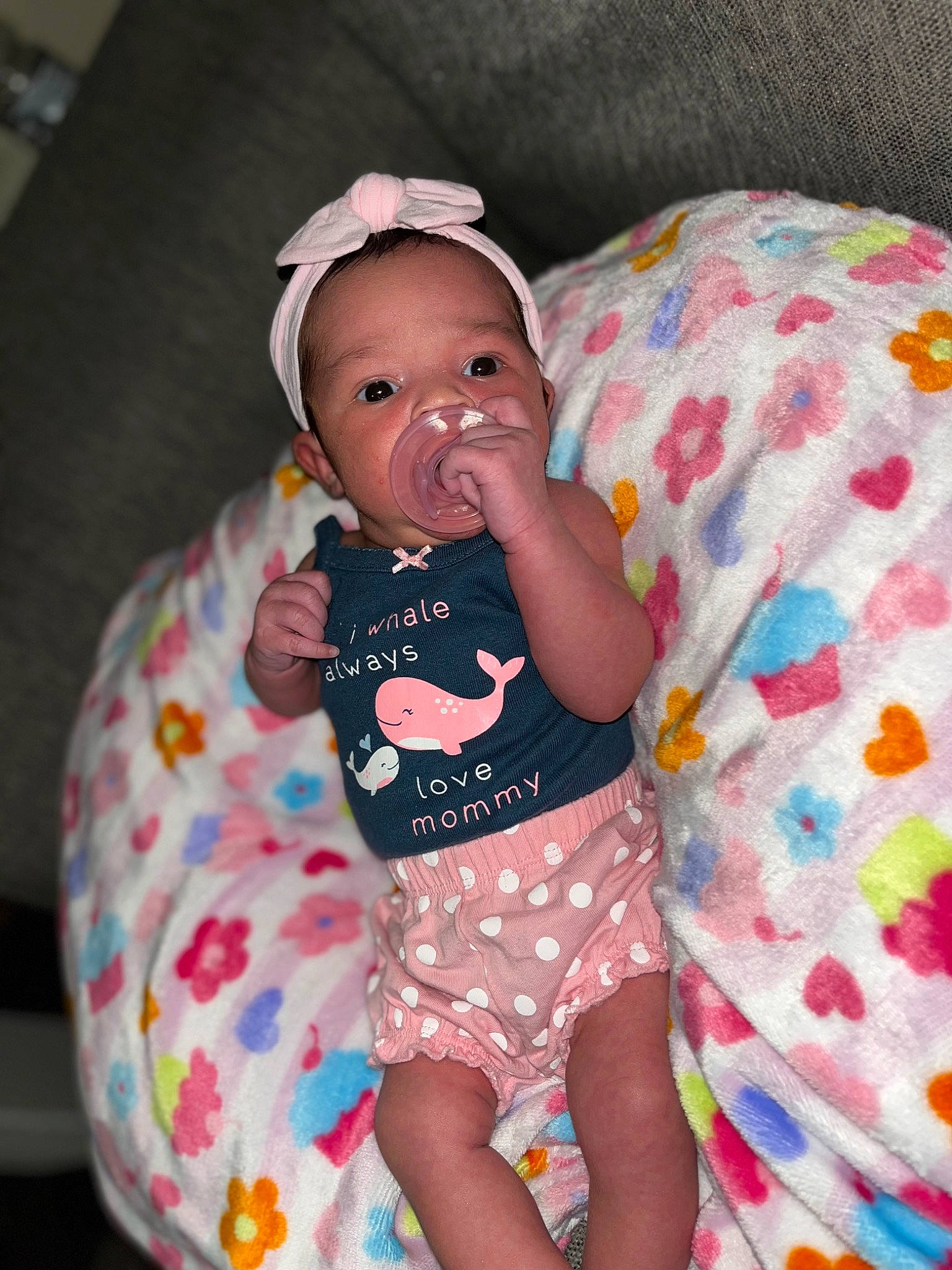 Avaya is registered to the contest to win money with this photo: arm, baby, baby_toddler_clothing, comfort, eye, fun, happy, head, human_body, leg, mammal, mouth, person, pink, purple, shorts, skin, sleeve, t_shirt, thigh