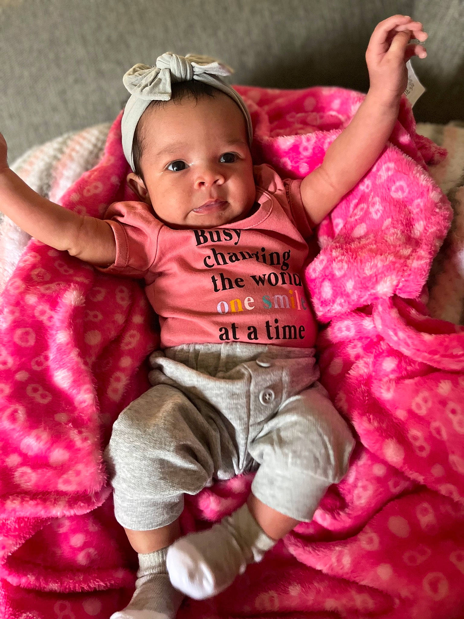 Avaya joined the competition — help win amazing prizes! baby, baby_products, baby_toddler_clothing, cheek, child, dress, finger, fun, gesture, hand, happy, magenta, person, pink, product, purple, skin, sleeve, smile, textile