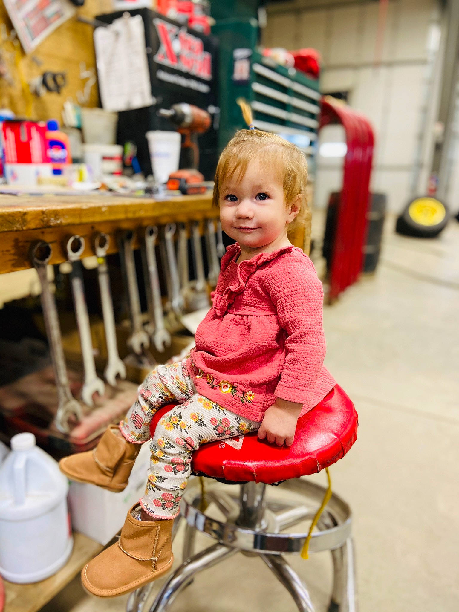 Abbygail is registered to the contest to win money with this photo: chair, child, event, fashion_accessory, fashion_design, fun, happy, human_leg, joy, leisure, magenta, peach, person, play, recreation, room, shelf, shopping, sitting, smile