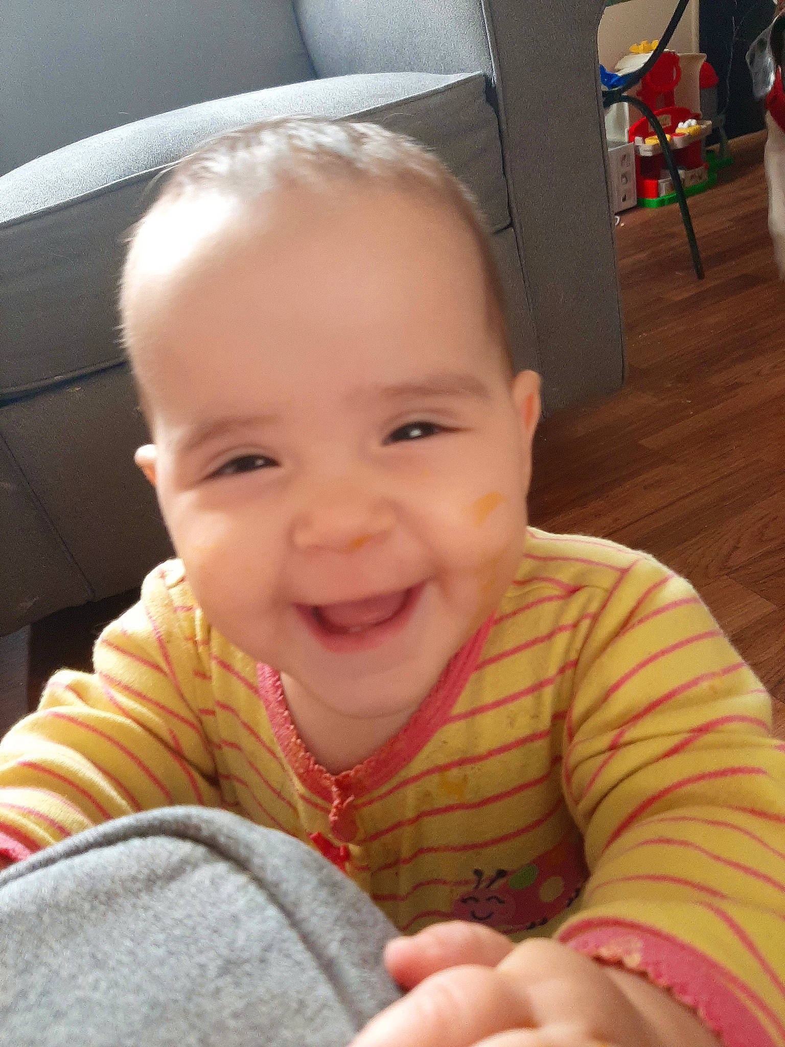 Persephone is registered to the contest to win money with this photo: baby, cheek, chin, ear, eye, eyebrow, face, finger, gesture, hairstyle, happy, head, iris, joy, lip, mouth, nose, person, skin, smile