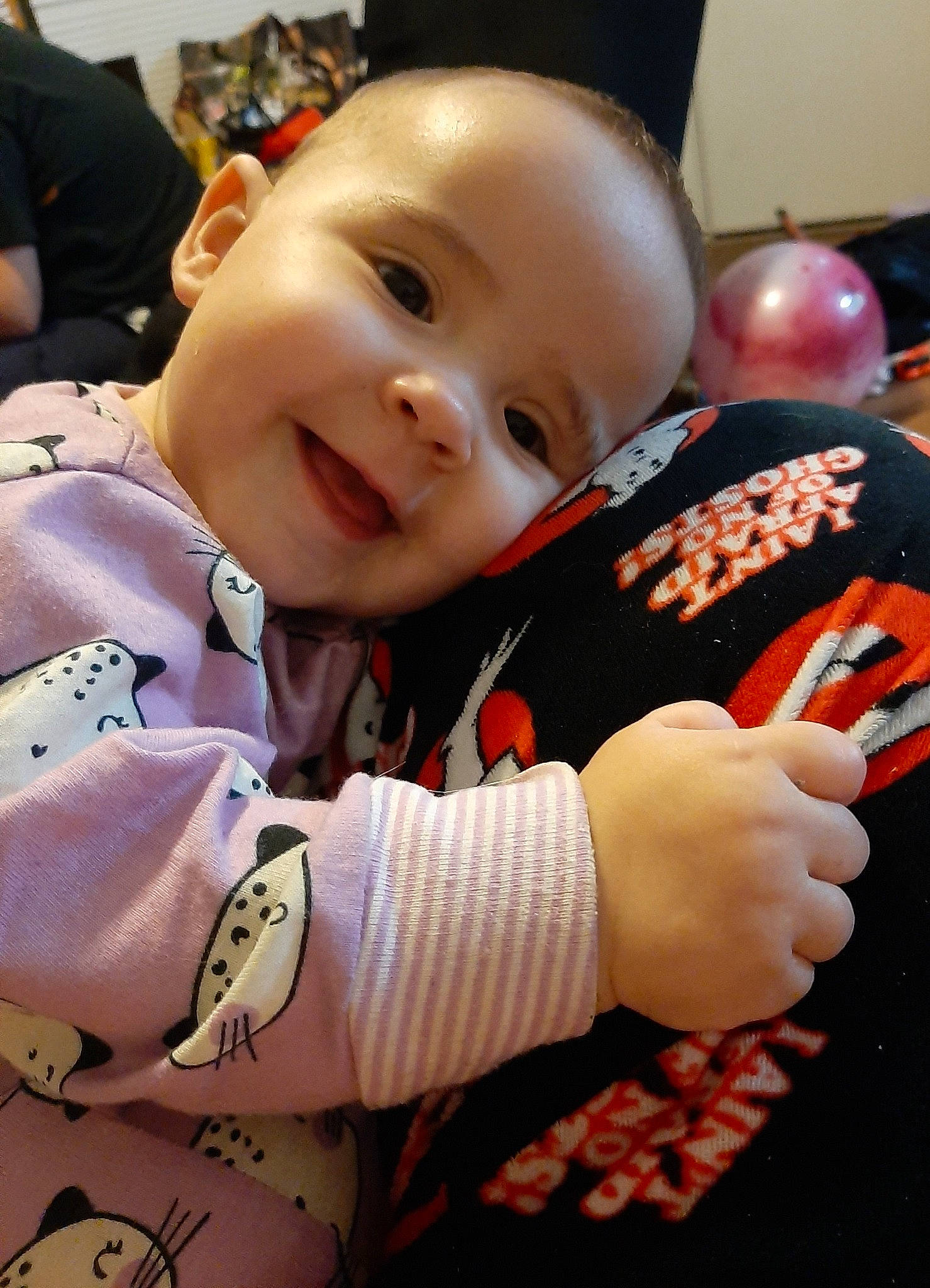 Persephone joined the competition — help win amazing prizes! baby, baby_toddler_clothing, cheek, child, event, eye, finger, fun, gesture, happy, joy, laugh, pattern, person, photograph, sitting, sleeve, smile, t_shirt, thumb