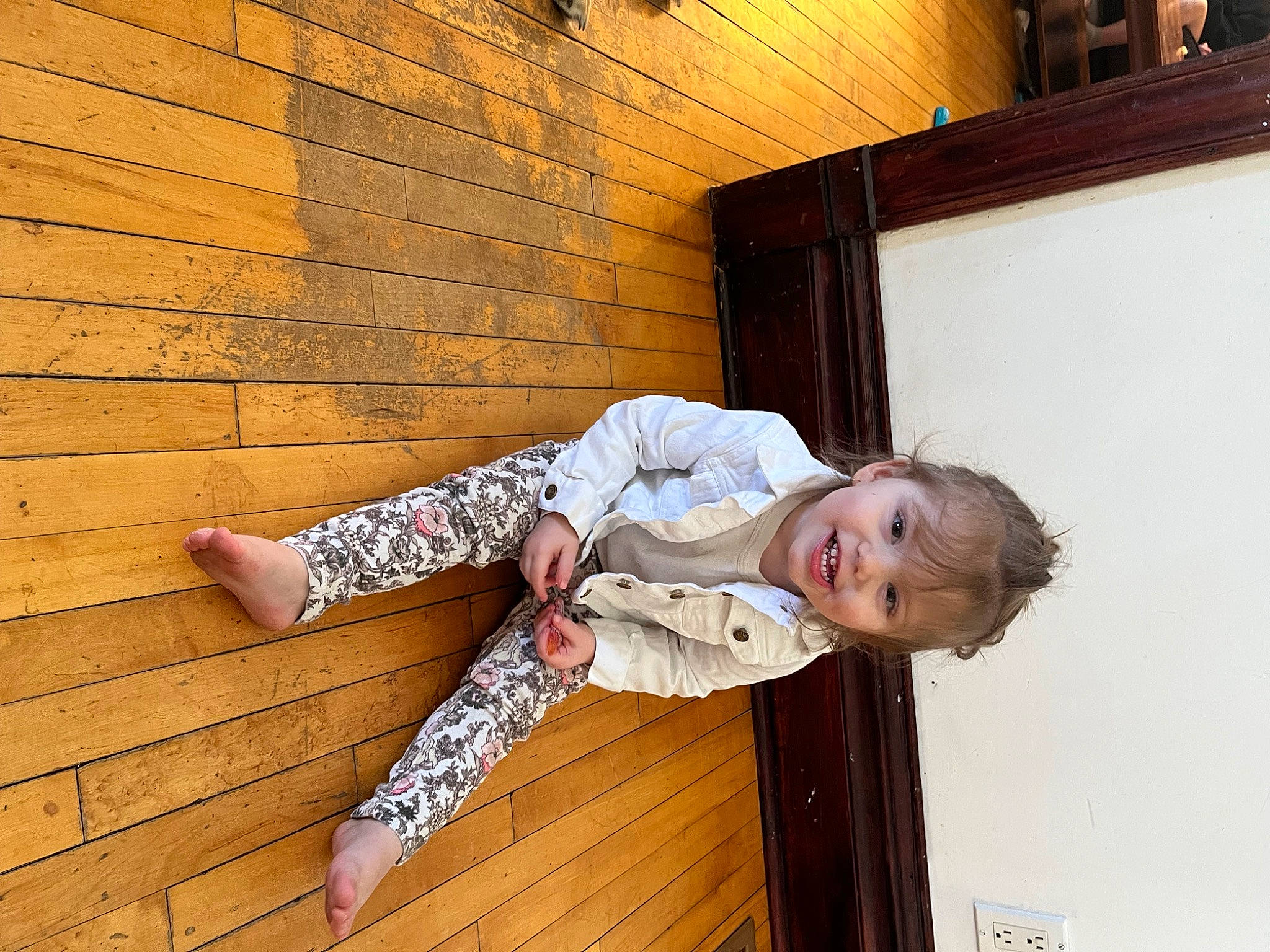 Ayva joined the competition — help win amazing prizes! baby_toddler_clothing, brick, brickwork, child, elbow, flash_photography, flooring, happy, hardwood, human_leg, joy, knee, pattern, person, room, sitting, sleeve, thigh, toddler, wood