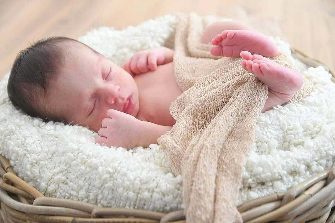 Conor participe au concours pour gagner de l'argent avec cette photo : baby, baby_products, baby_sleeping, bedtime, blanket, cheek, child, comfort, fur, nap, person, photograph, photography, pink, portrait_photography, product, skin, sleep, textile, toddler