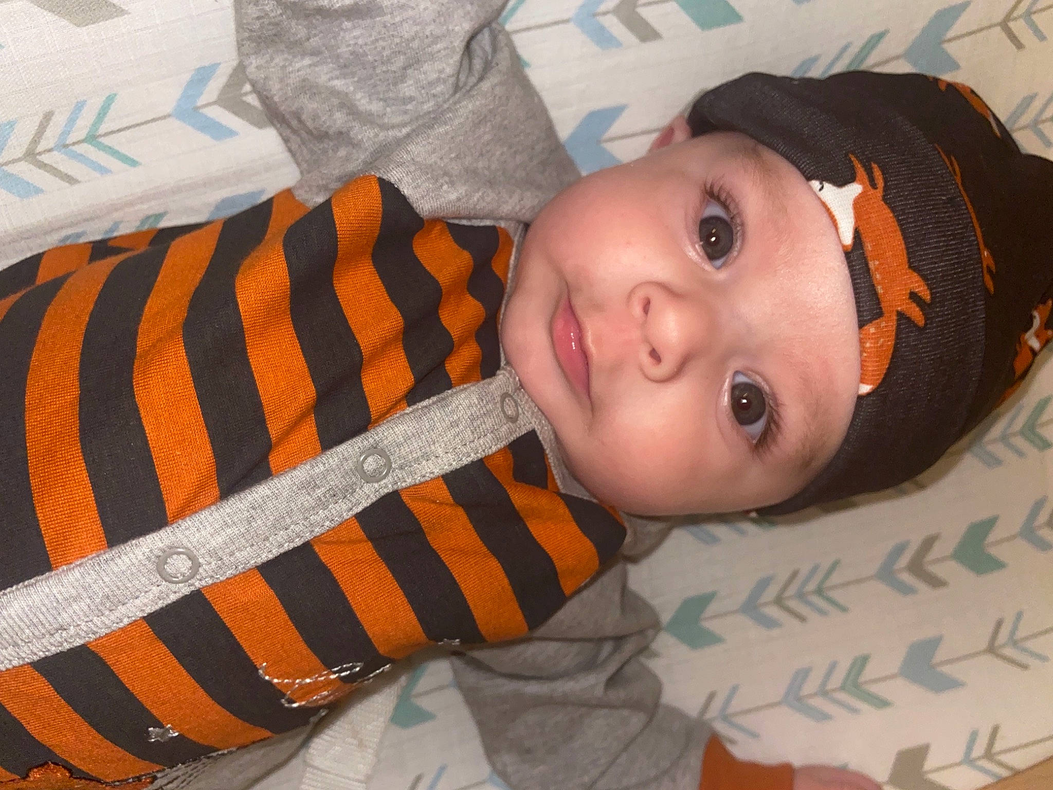 Kasey joined the competition — help win amazing prizes! baby, baby_toddler_clothing, cheek, child, chin, comfort, cool, eyebrow, hat, headgear, headwear, iris, linens, lip, mouth, nose, orange, outerwear, person, skin