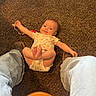 baby, infant, carpet, floor, jeans, boots, person, child, indoor, pacifier, clothing, legs, casual, brown, blue, cute, smiling, playful, home, relaxed