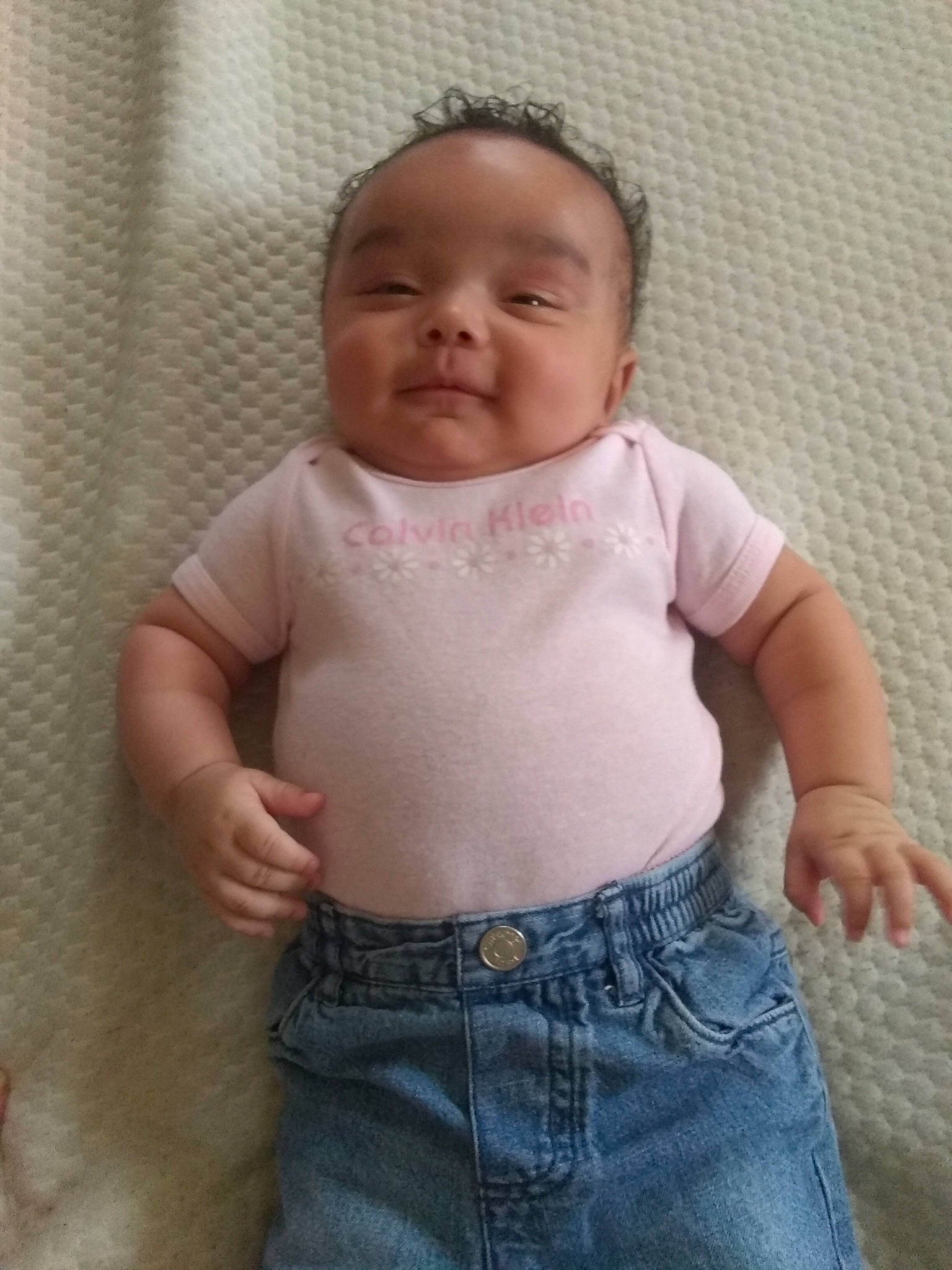 Azalia is registered to the contest to win money with this photo: abdomen, baby, baby_products, baby_toddler_clothing, cheek, chest, child, denim, finger, joint, navel, organ, person, pink, pocket, skin, standing, stomach, toddler, trunk
