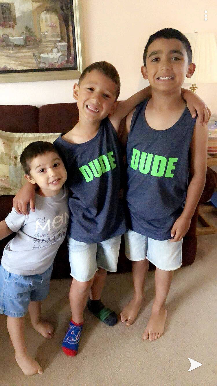 Stephen is registered to the contest to win money with this photo: child, cousin, daughter, family, fun, happy, joy, people, person, shorts, sibling, smile, standing, t_shirt, toddler, top, vacation