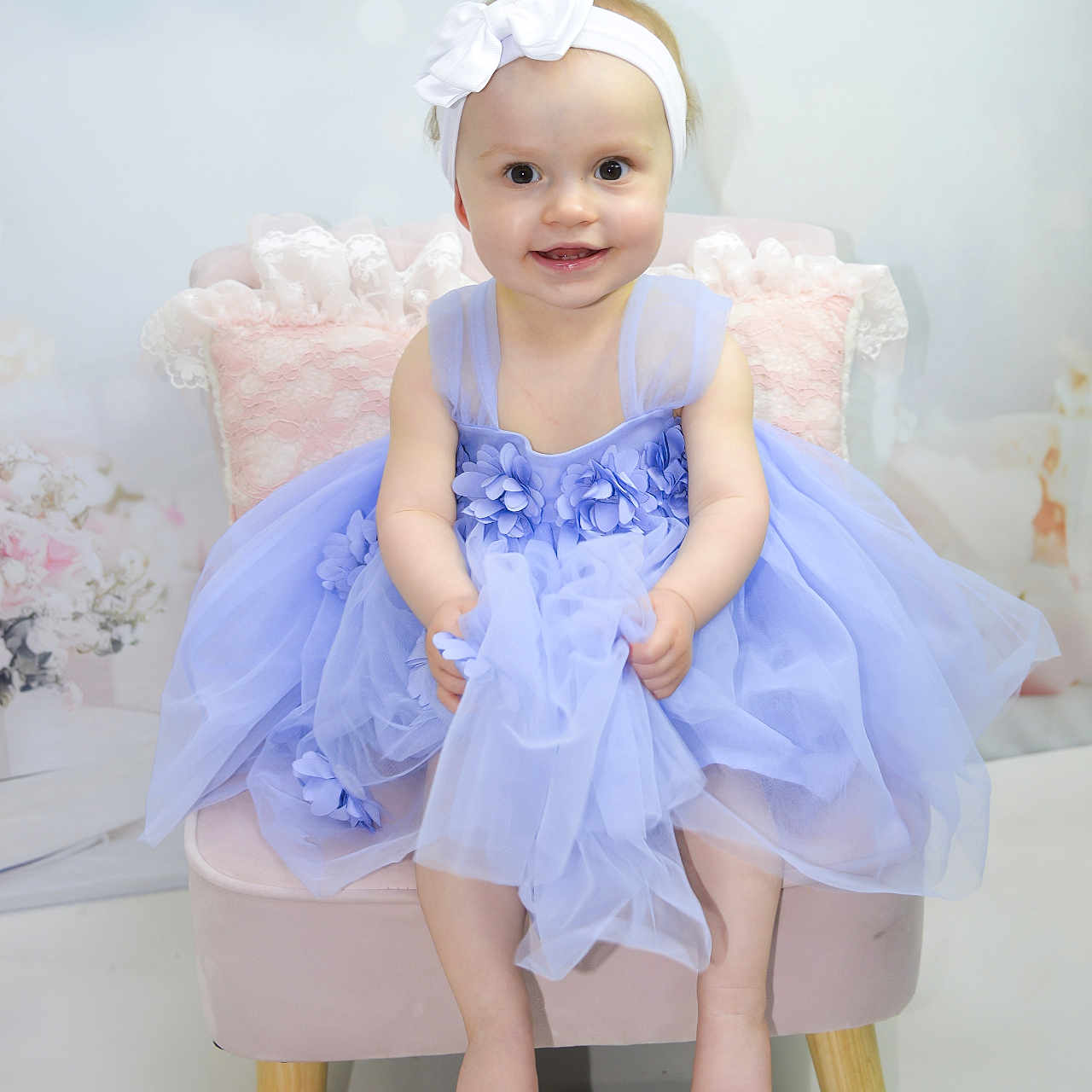 Alys joined the competition — help win amazing prizes! baby, bonnet, clothing, doll, dress, eveningdress, face, fashion, flower, flowerarrangement, flowerbouquet, formalwear, furniture, gown, hat, head, person, plant, sitting, toy