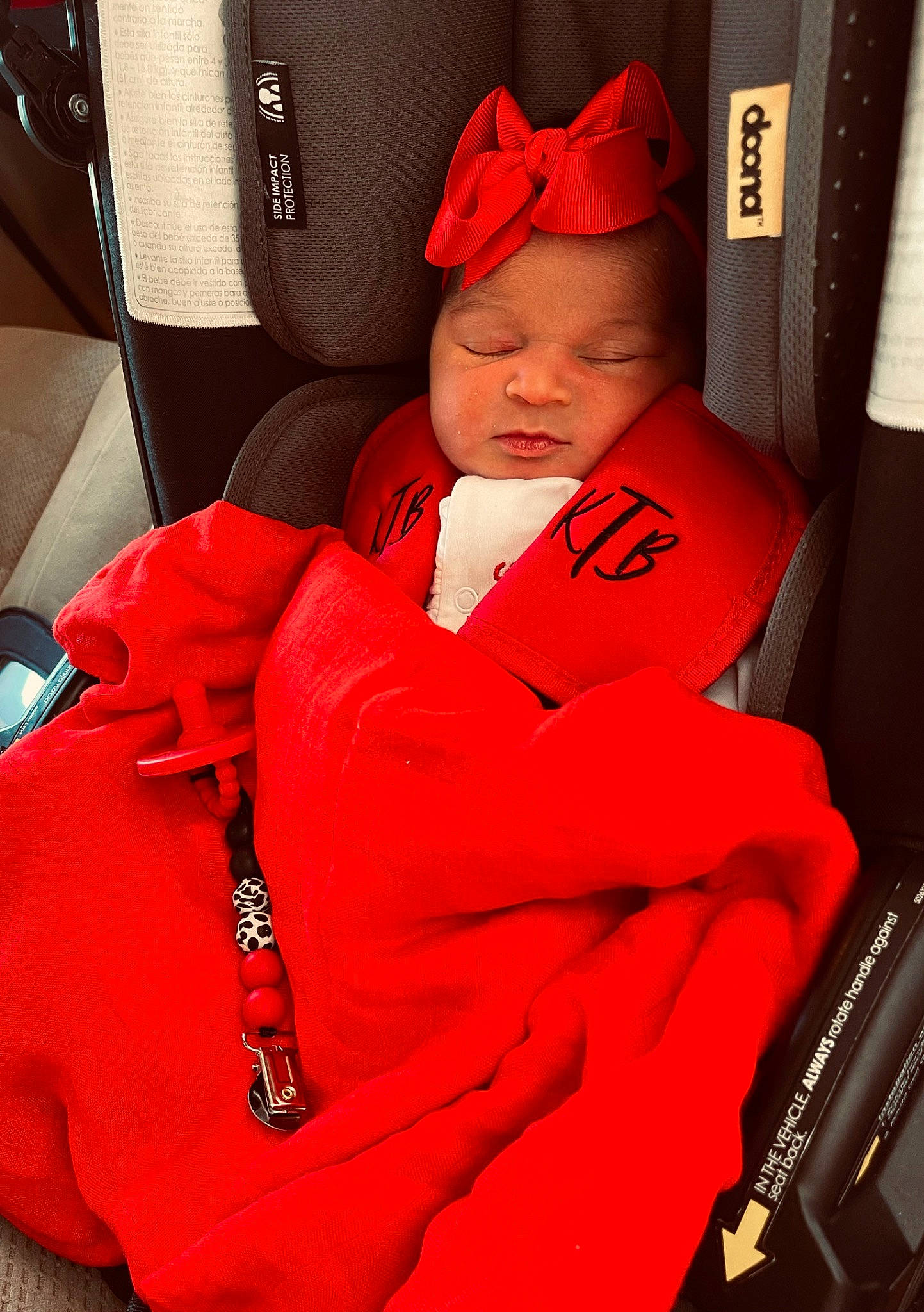 Kyndall joined the competition — help win amazing prizes! airline, automotive_design, baseball_cap, cap, car_seat, car_seat_cover, carmine, comfort, eyewear, fashion_accessory, head_restraint, headwear, magenta, motor_vehicle, orange, passenger, person, personal_protective_equipment, red, sleeve