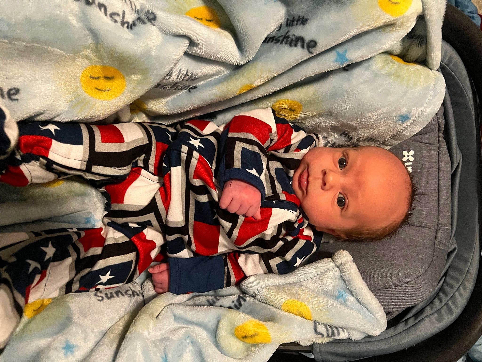 Waylon is registered to the contest to win money with this photo: art, baby, baby_carriage, baby_products, baby_safety, baby_sleeping, baby_toddler_clothing, car_seat, carmine, child, comfort, happy, linens, nap, pattern, person, room, sleep, toddler, visual_arts