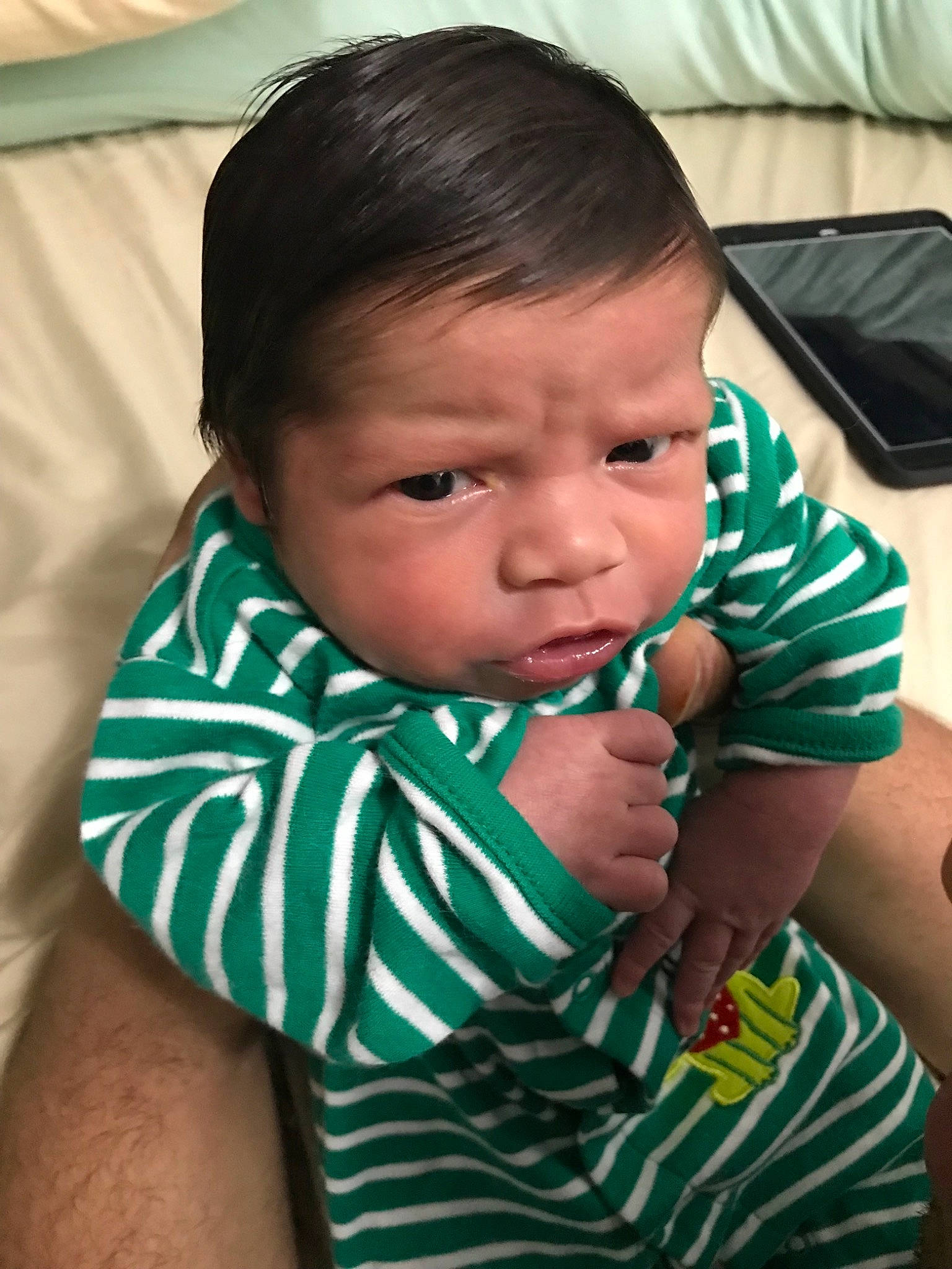 Julian joined the competition — help win amazing prizes! baby, cheek, child, face, finger, green, neck, nose, person, skin, thumb, toddler