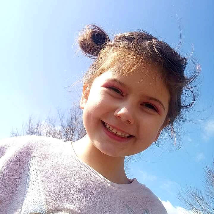 Aubrie joined the competition — help win amazing prizes! chin, cloud, flash_photography, gesture, hair, happy, iris, jaw, joy, lip, neck, people_in_nature, person, shoulder, skin, sky, sleeve, smile, t_shirt, toddler