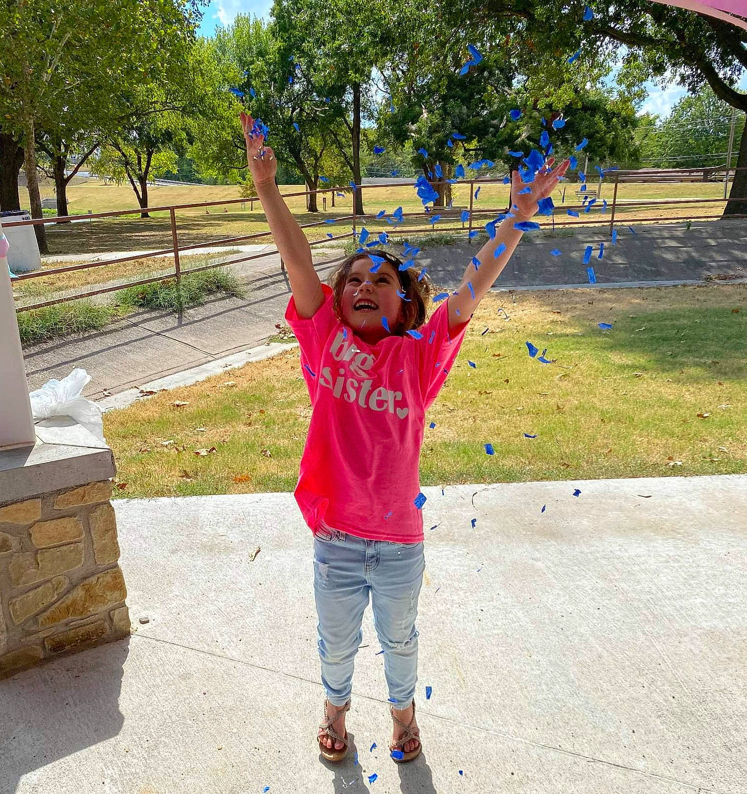 Aubrie joined the competition — help win amazing prizes! asphalt, city, denim, electric_blue, fun, gesture, grass, happy, jeans, leisure, people_in_nature, person, plant, recreation, road_surface, shipping_box, sleeve, t_shirt, travel, tree