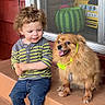 Gideon joined the competition — help win amazing prizes! child, toddler, dog, pet, curly_hair, striped_shirt, jeans, barefoot, porch, step, smiling, happy, animal, companion, outdoor, window, toy, red_wall, leash, collar